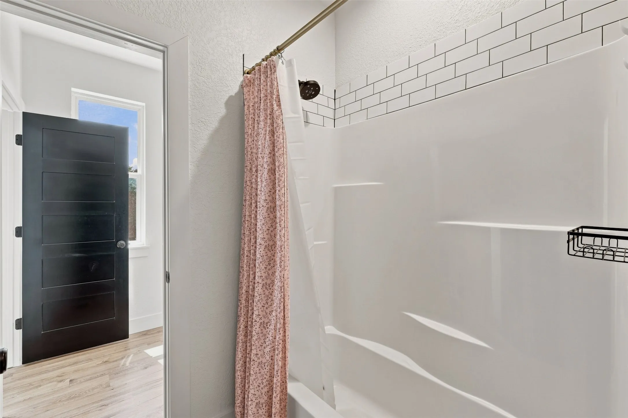 Upstairs Hollywood-style bathroom offers dual private vanity/toilet areas connected by the shared tub/shower in between.