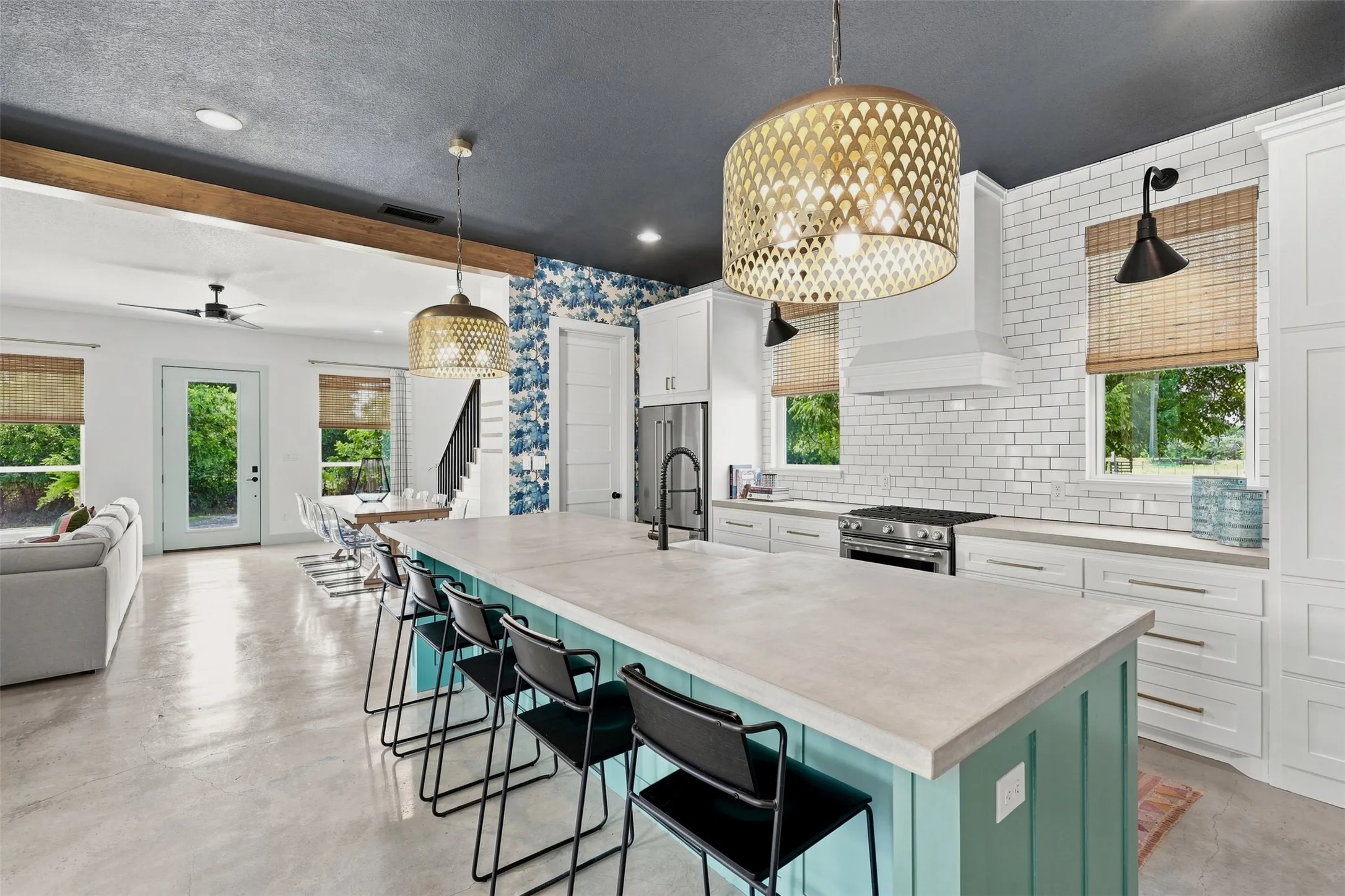 Concrete island with eat-in breakfast bar.