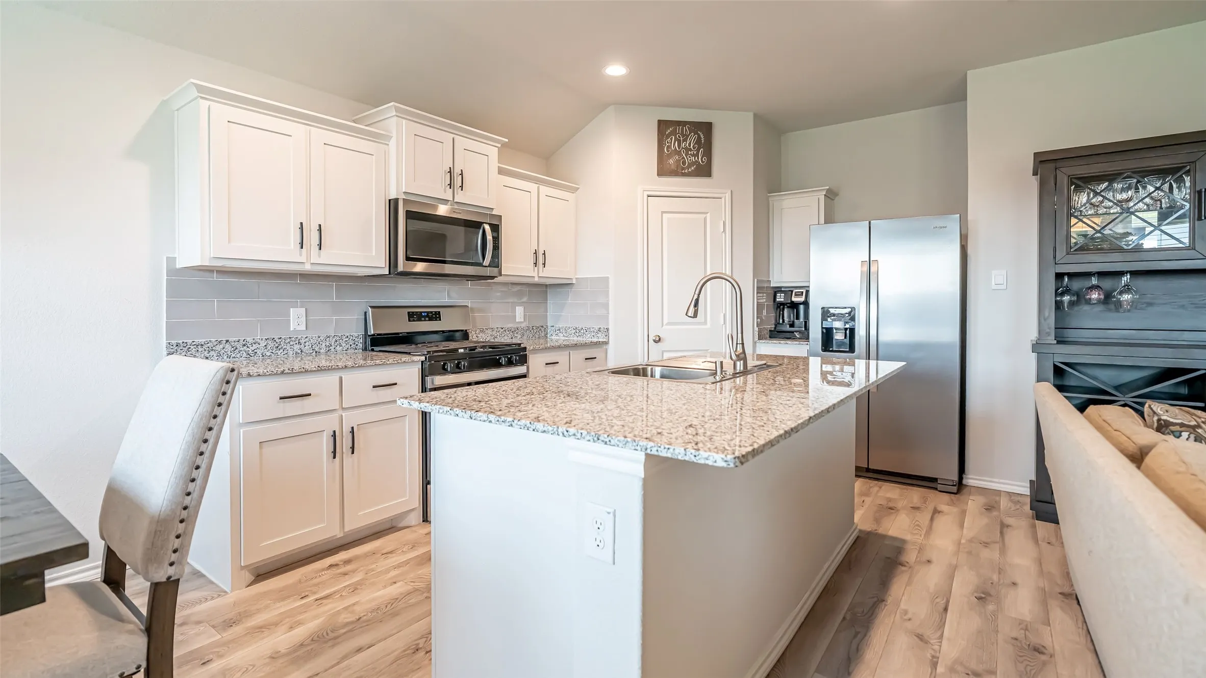 kitchen island with added subway tile backsplash.