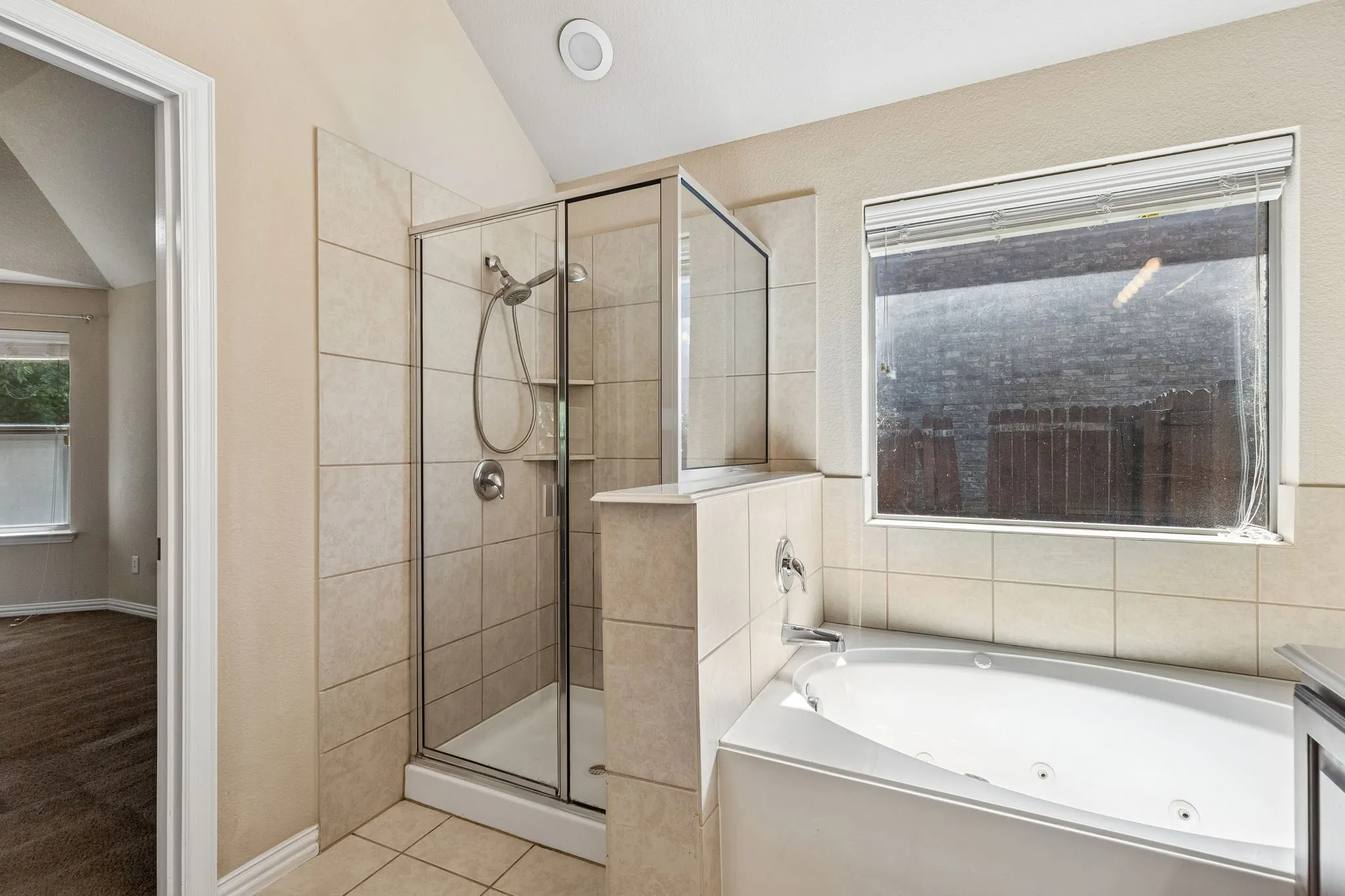 Primary Bathroom with Separate Shower and Garden Tub