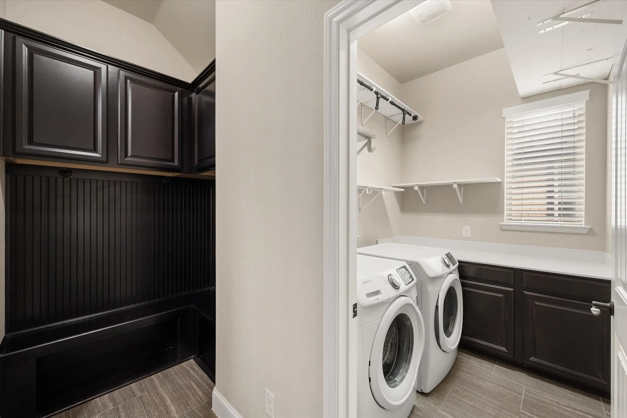 Great mud bench as you come in from the garage. Added shelving for the laundry!