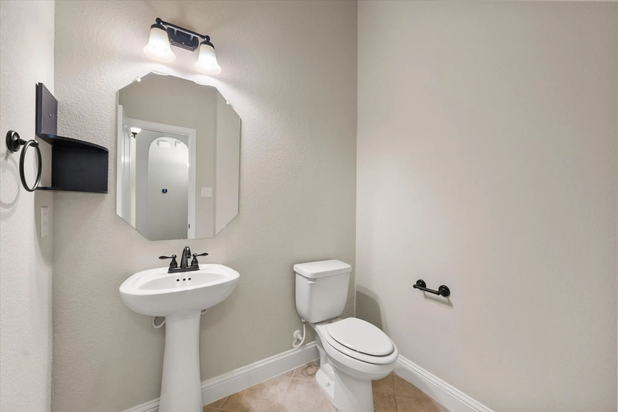 Powder bath welcomes guest downstairs so your other bathrooms stay private.