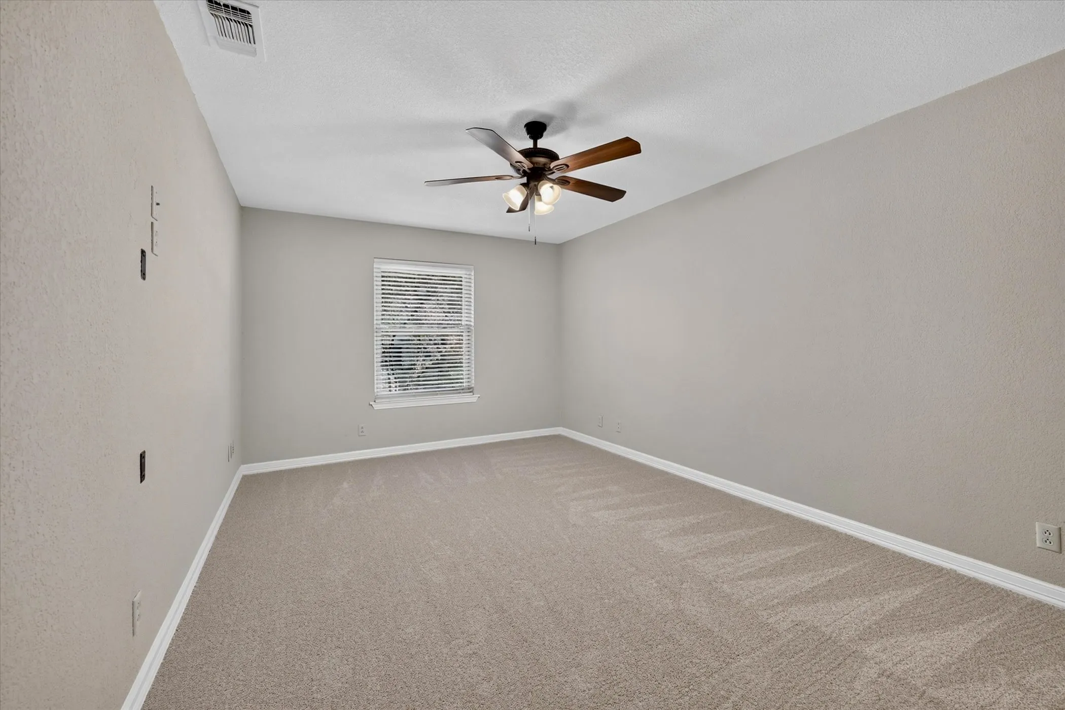 Oversized and flexible fourth bedroom ideal for guests, a home office, or hobby room