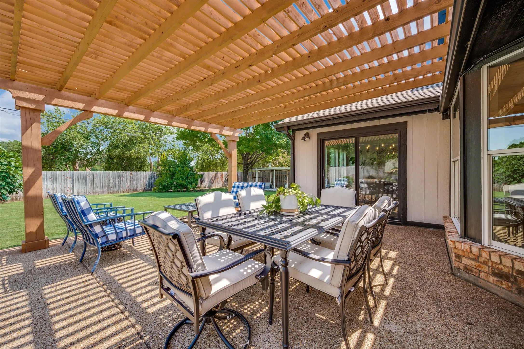 Enjoy the views of a landscaped private backyard