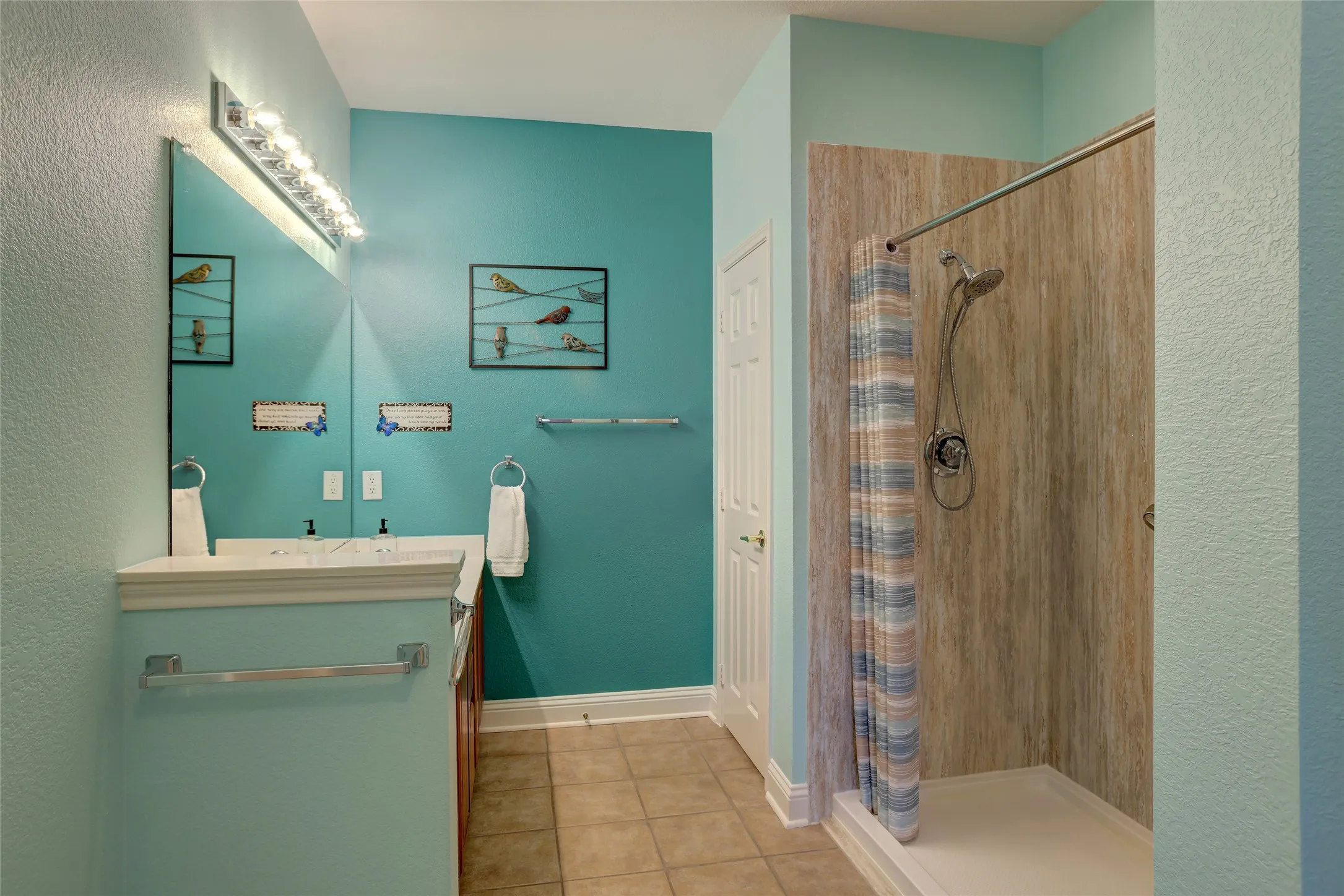 Remodeled huge shower with beautiful stone