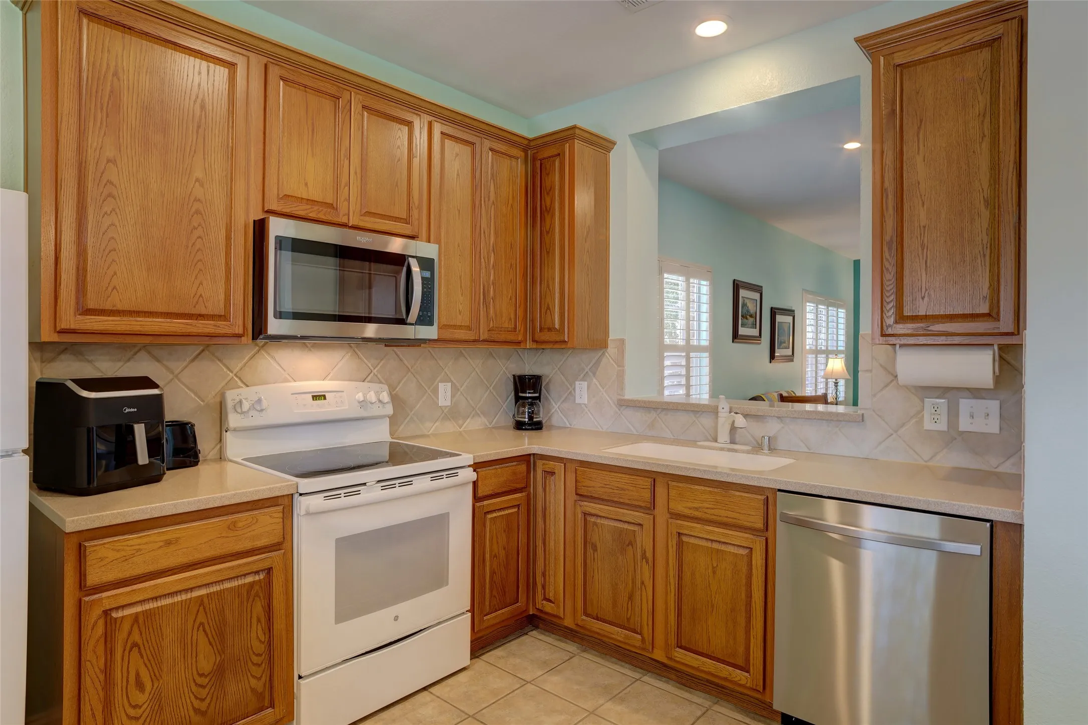 Notice the Corian like counters