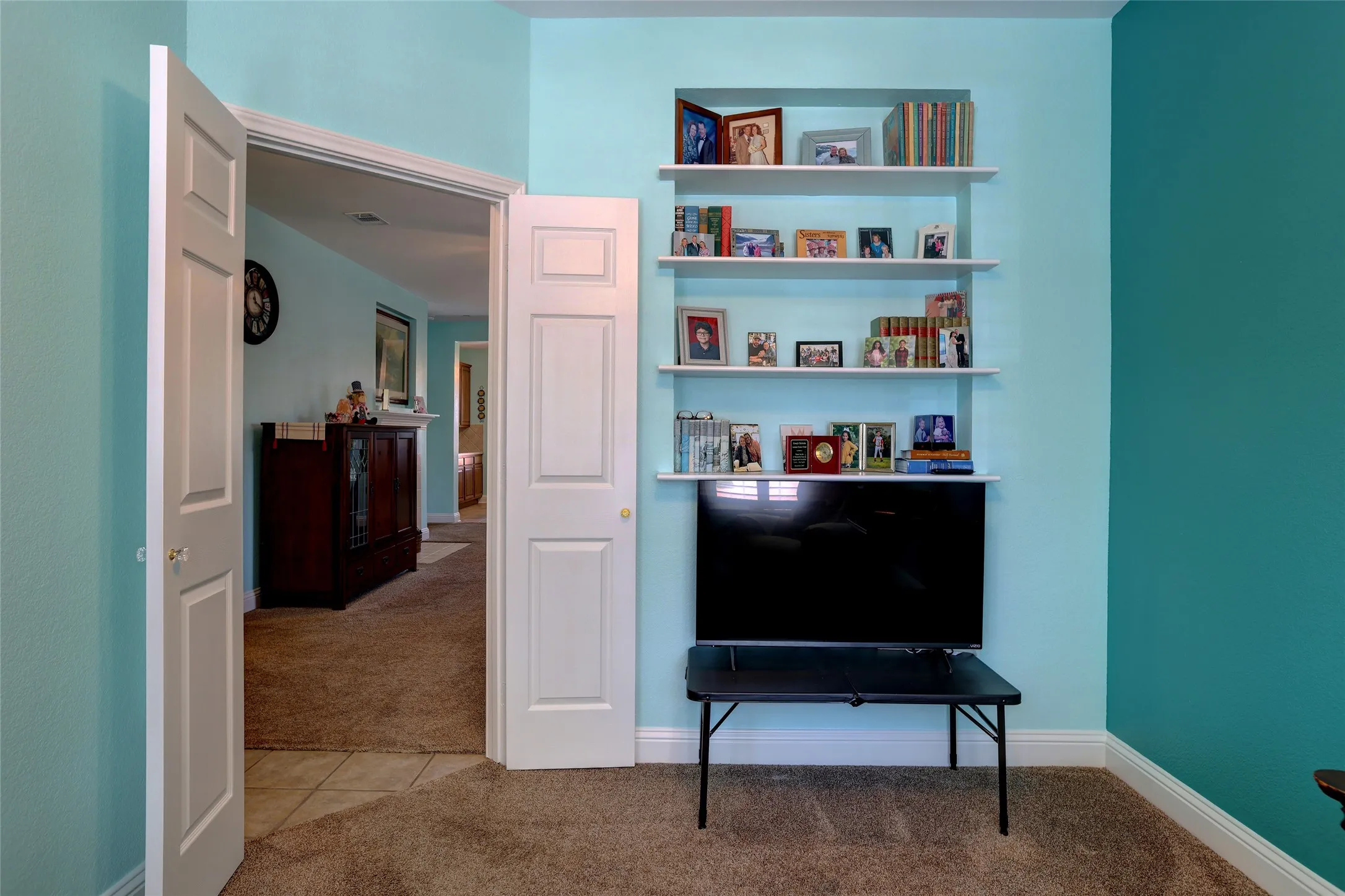 Rare private office or study with upgraded double entry doors with built in cabinets for extra storage