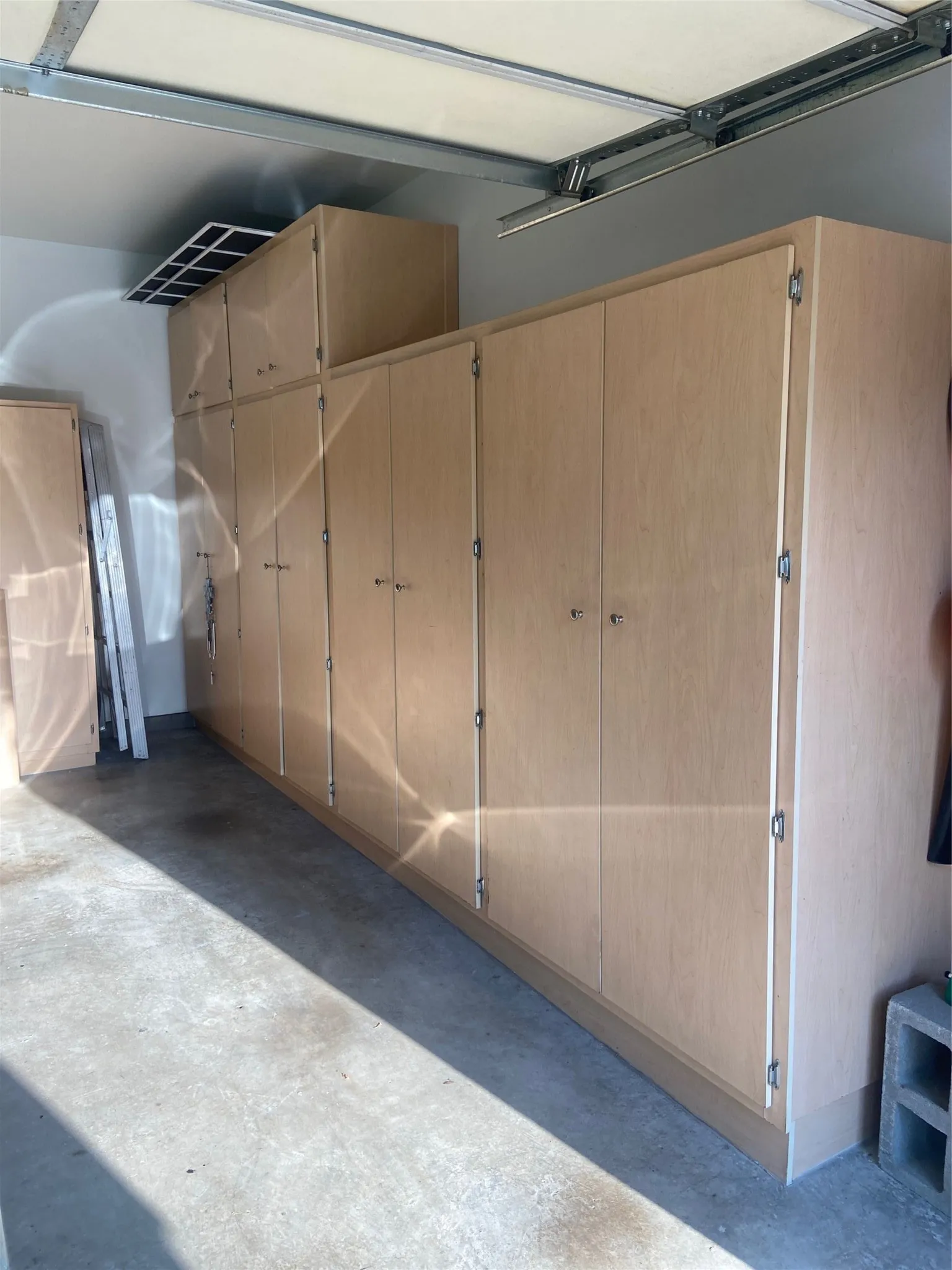 Notice the custom Shelves & Cabinets for lots of storage