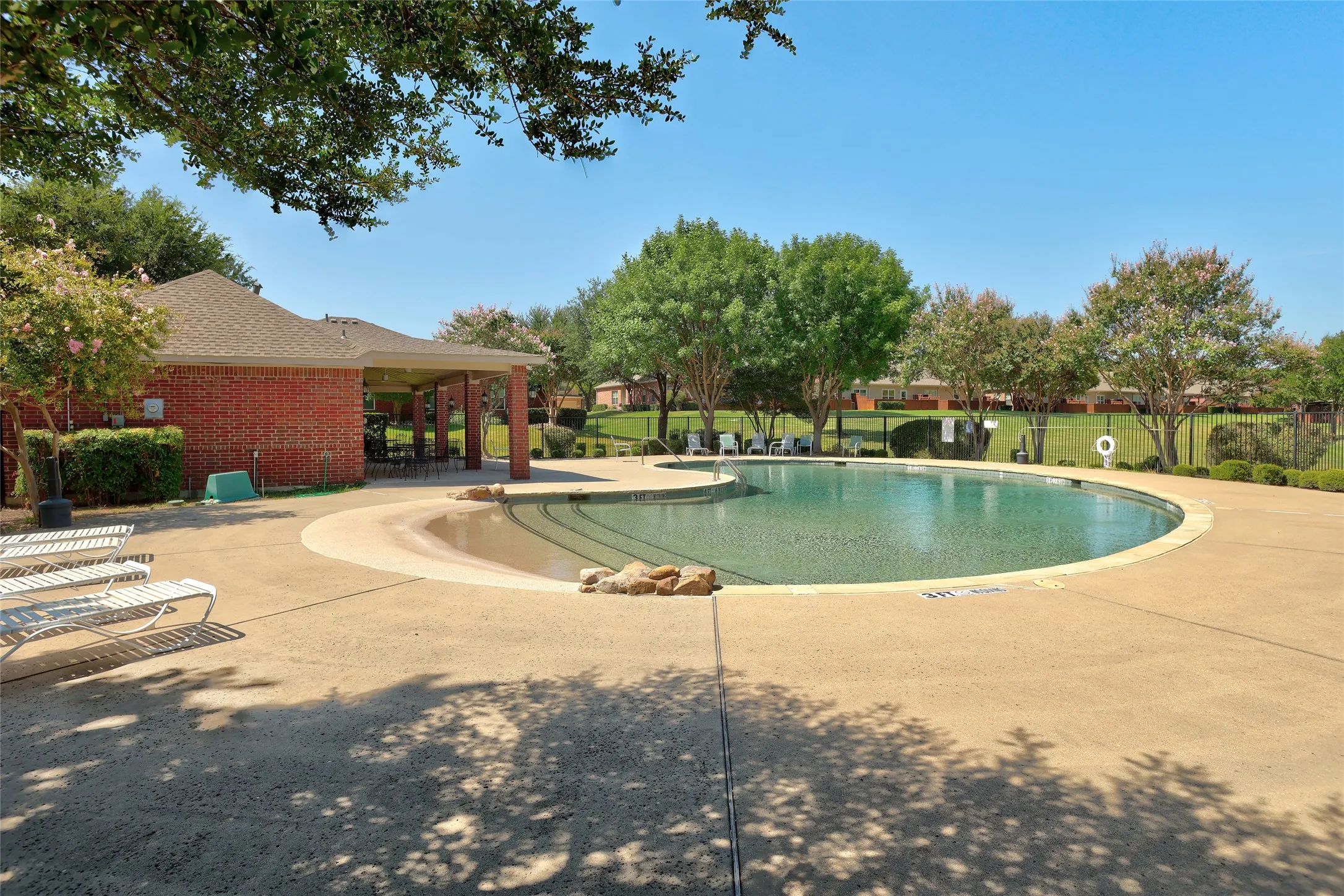 Community partial saltwater pool just steps away