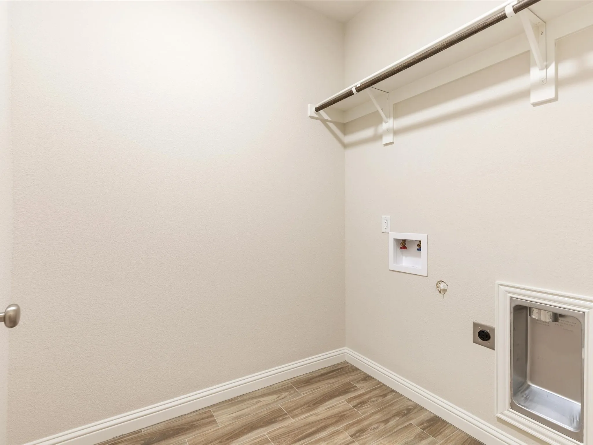 utility room with hanging space