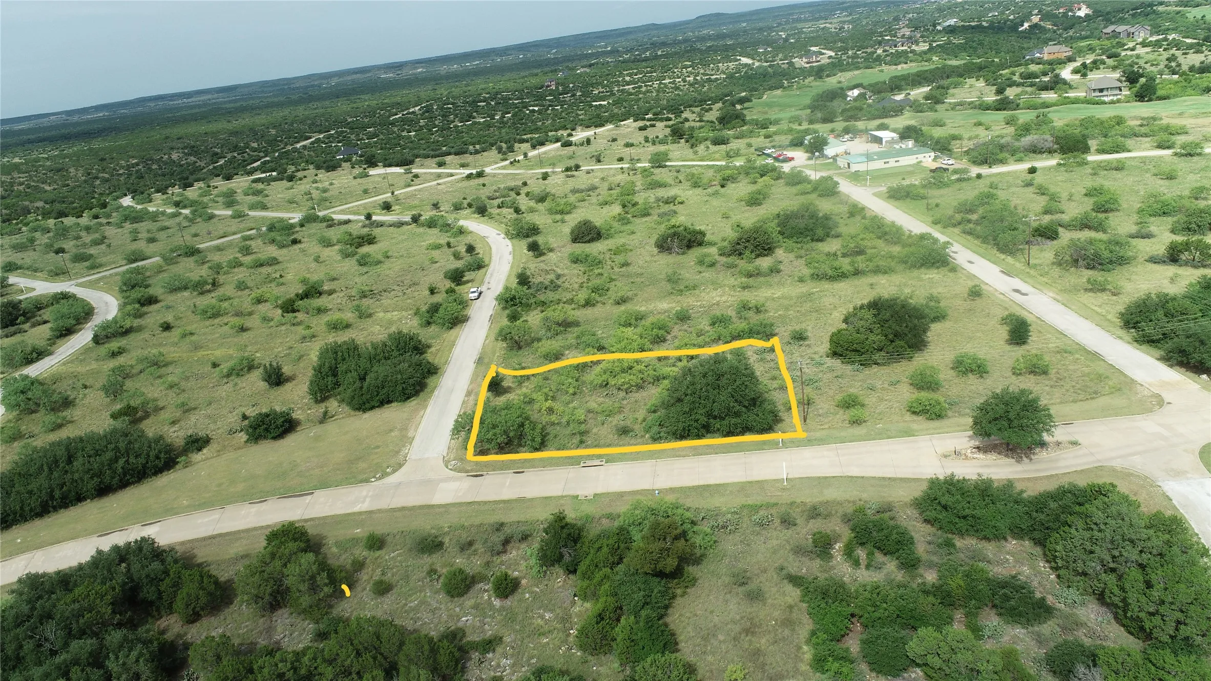 You build on your time frame with your builder of choice.  Plenty of room for house placement on this level lot. YELLOW LINES are APPROXIMATIONS ONLY.