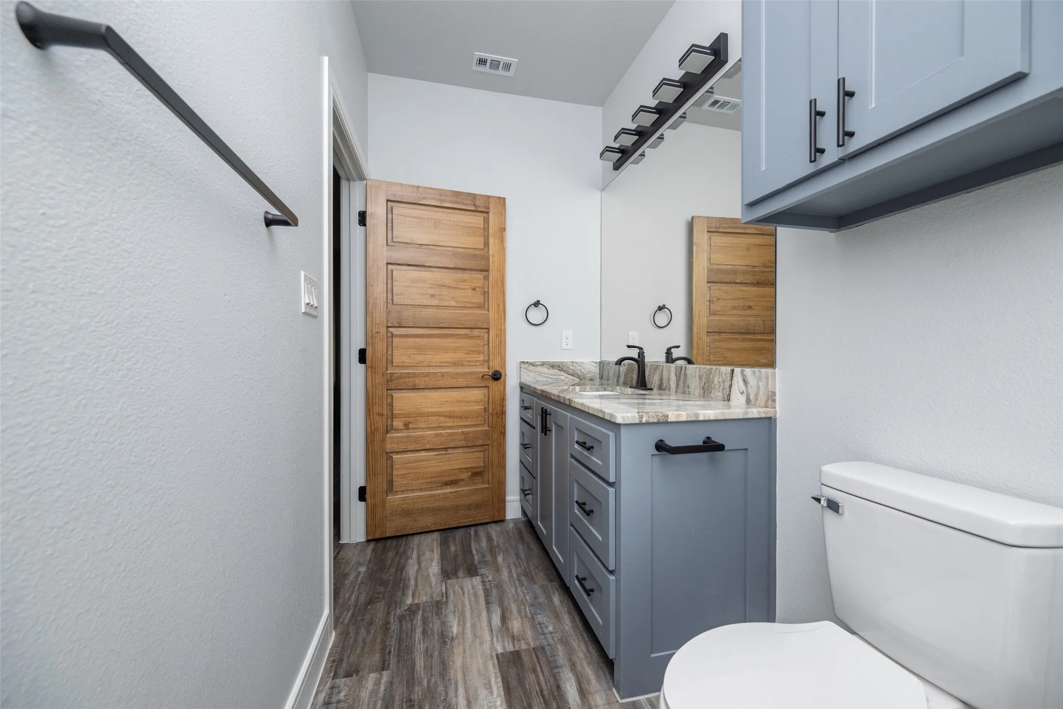 Dual vanity with stone countertop and integrated sinks