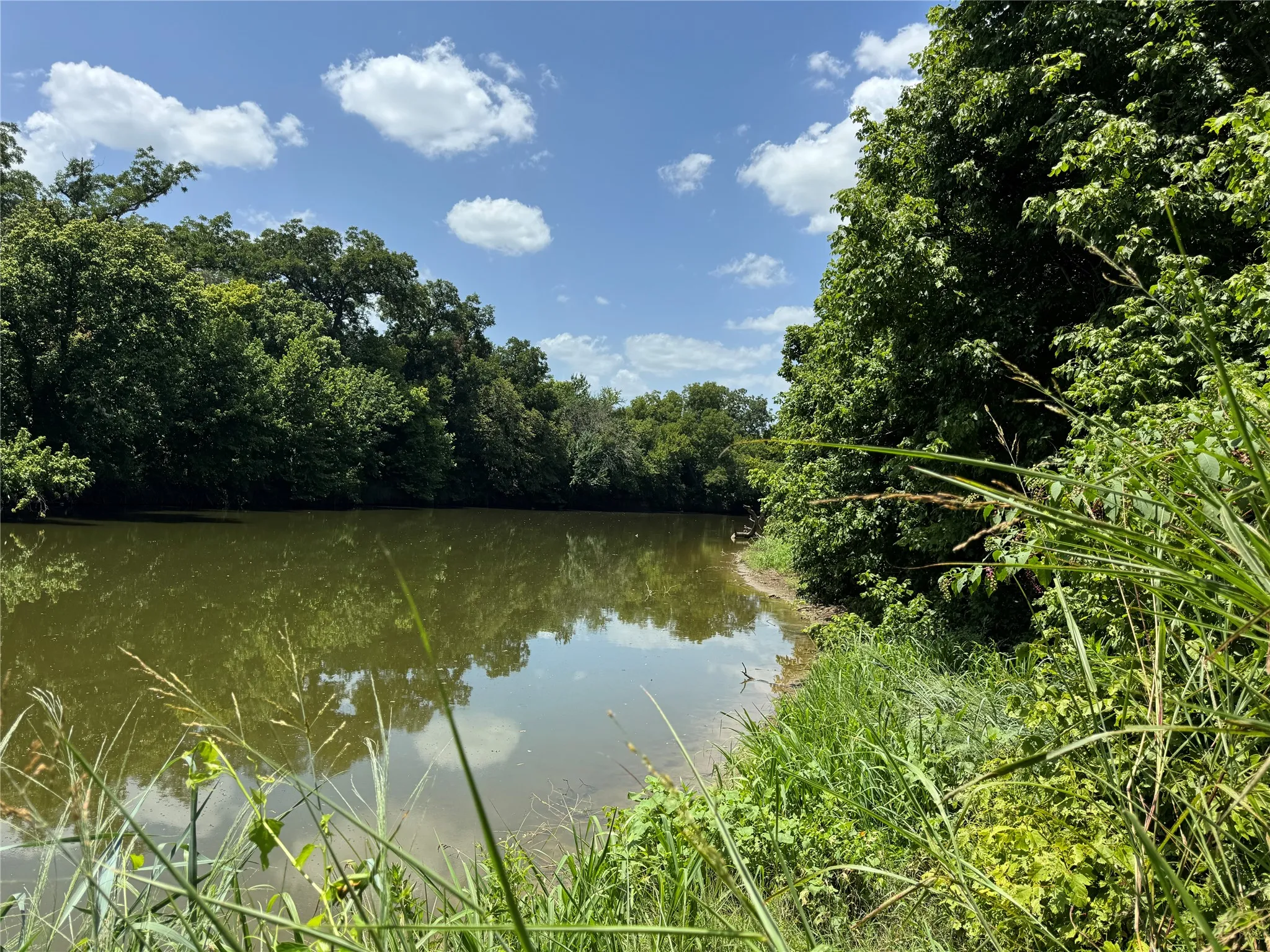 Core land on three sides with easy access to Ray Roberts for endless sunsets, boating, and fishing.