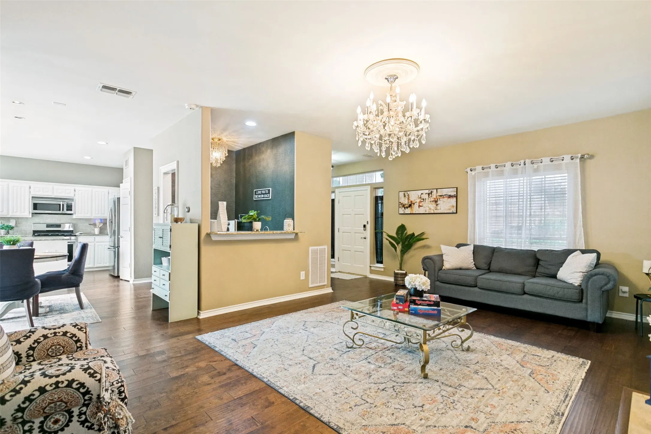 Open concept living area overlooking the kitchen, perfect for entertaining.