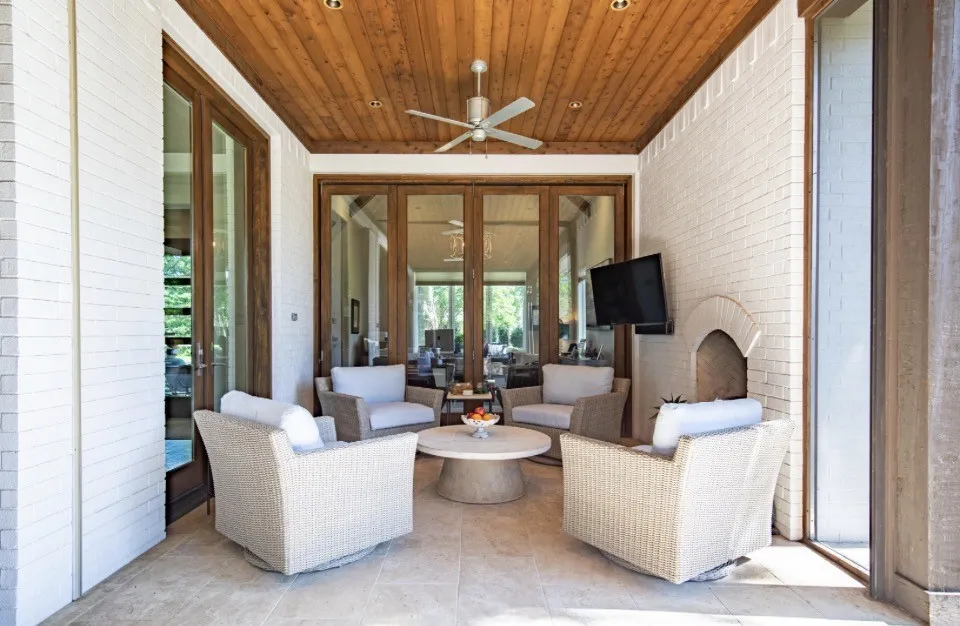 Gas fireplace plus retractable screen to close off and open wall of accordian doors into office