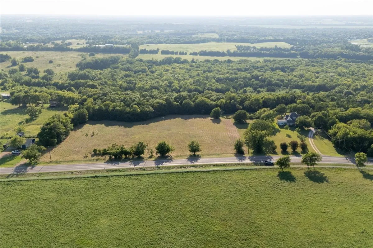 Level land with Beautiful Mature Trees