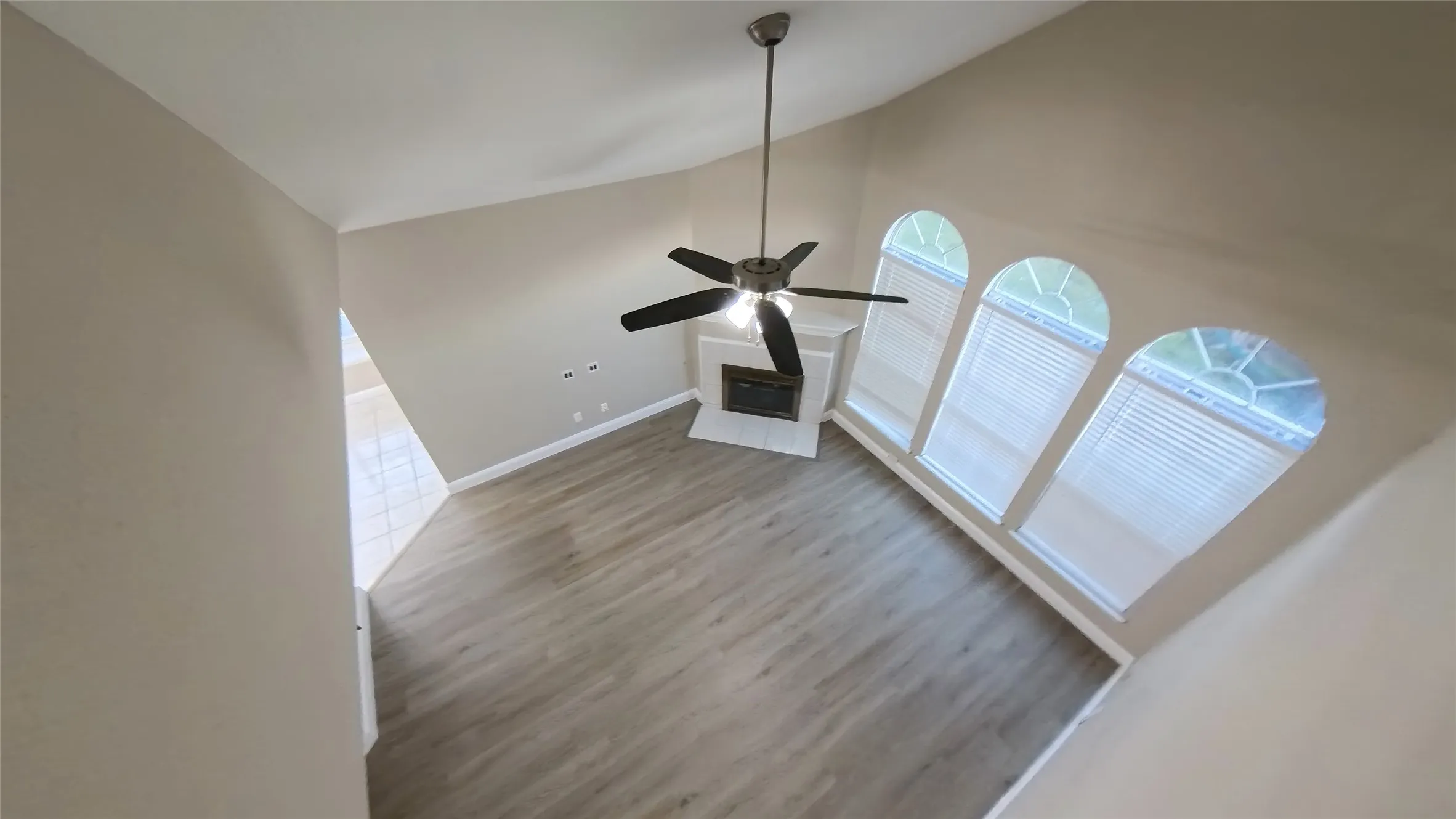 Interior details with wood-type flooring and ceiling fan