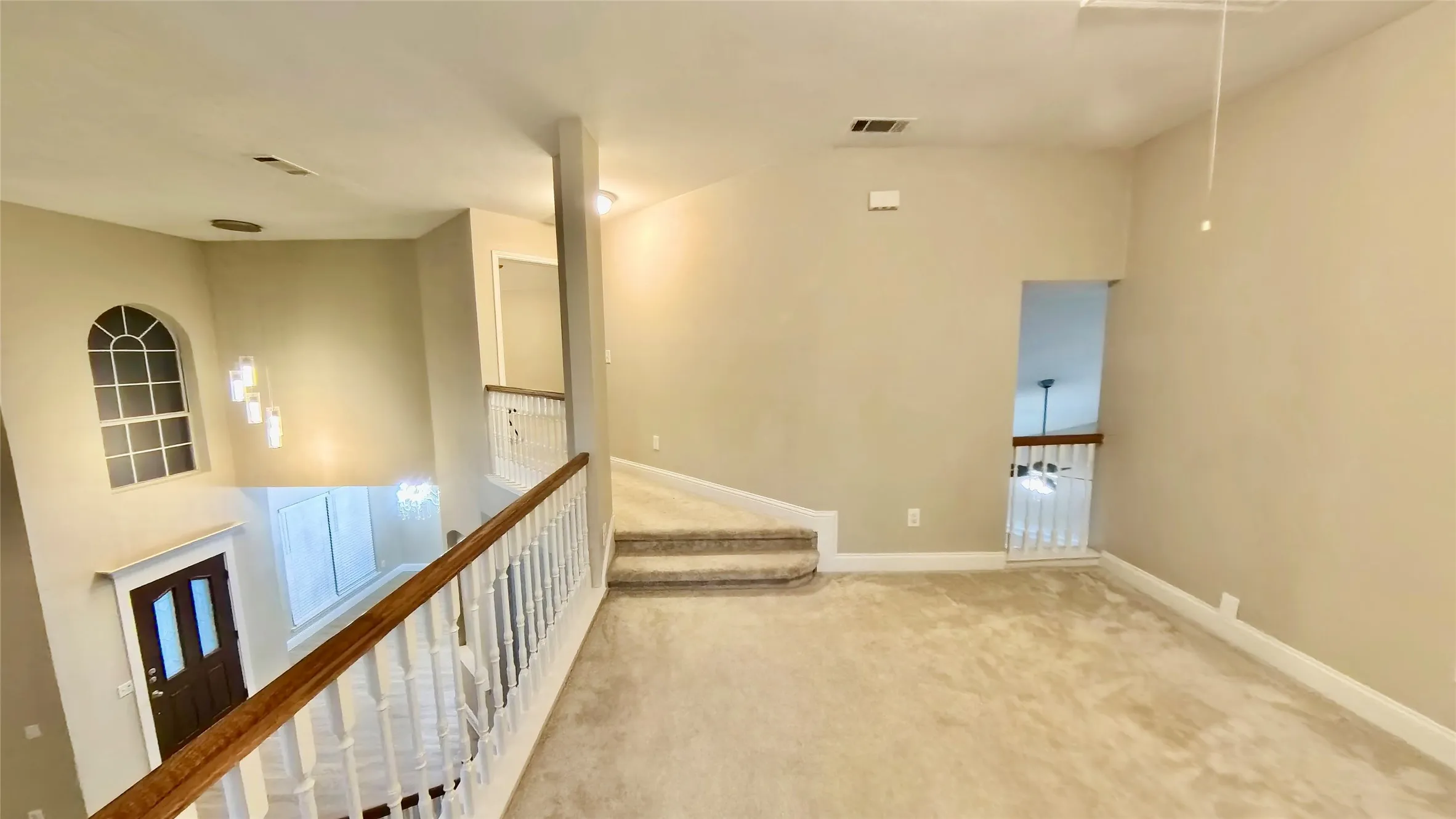 Corridor featuring carpet floors