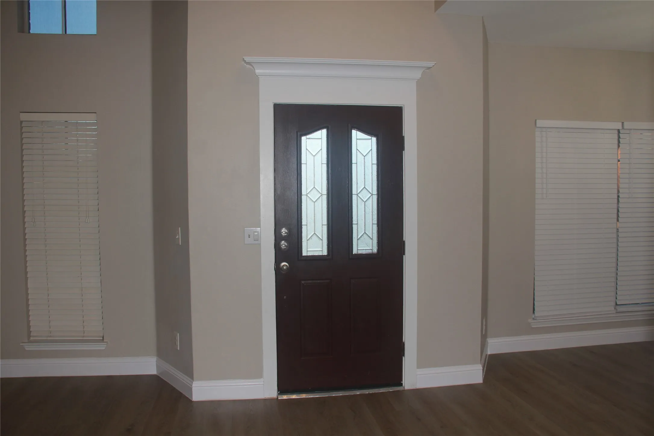 Foyer featuring dark hardwood / wood-style flooring