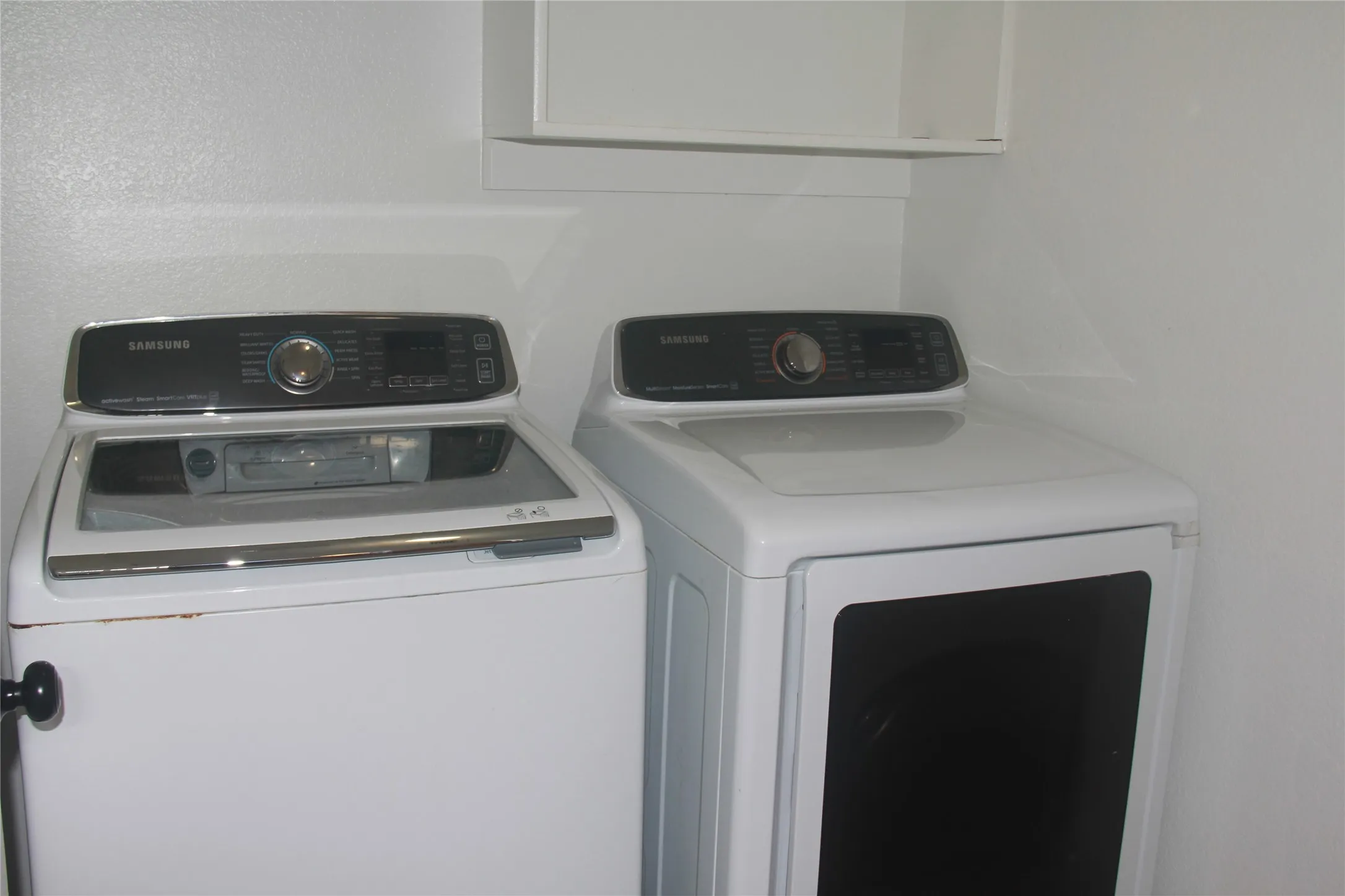 Laundry area featuring washer and clothes dryer