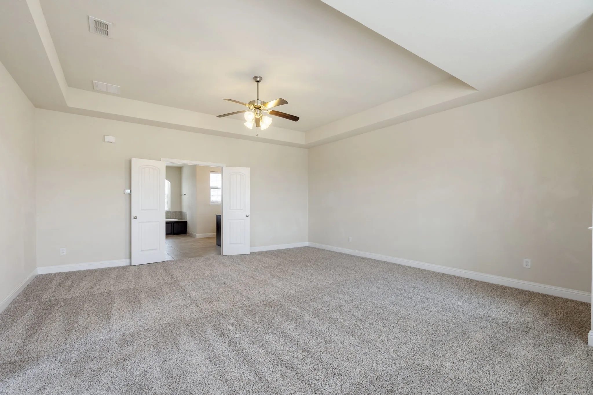 The primary bedroom has enough space to be a true retreat space with many different potential set ups!