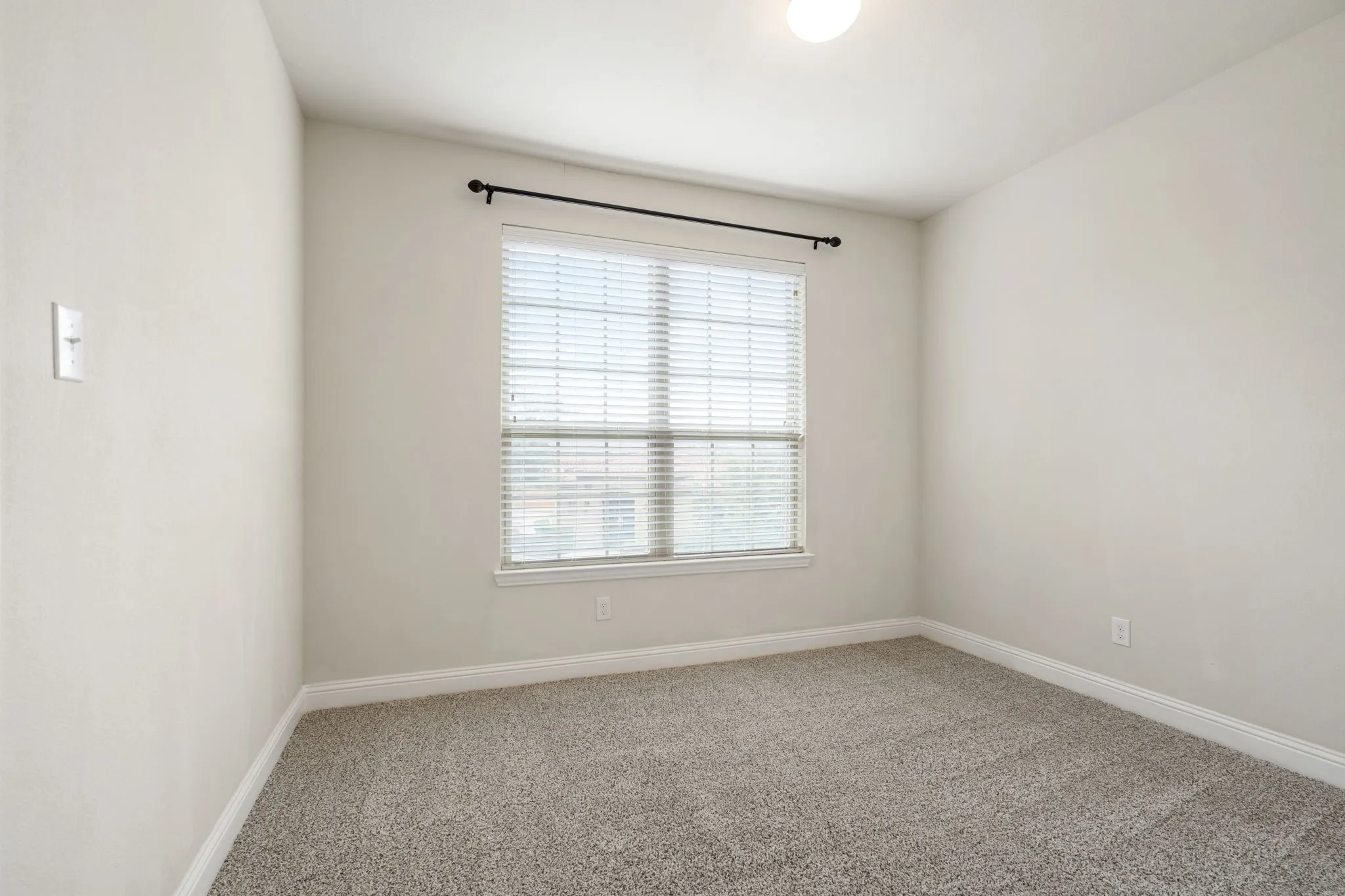 The bedroom on the second floor has a walk in closet.
