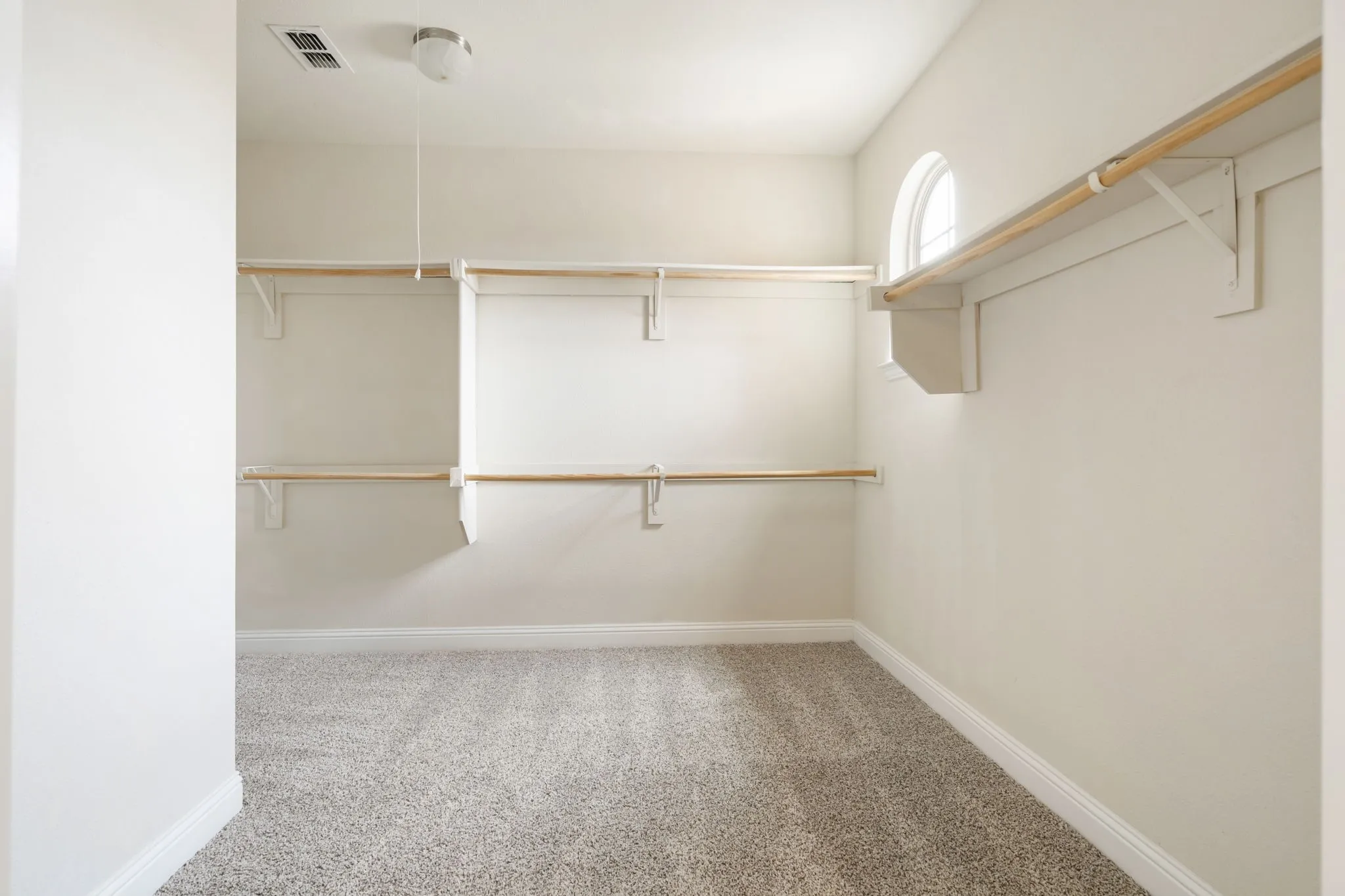 The closet is more than a "walk in".  It is larger than most secondary bedrooms!