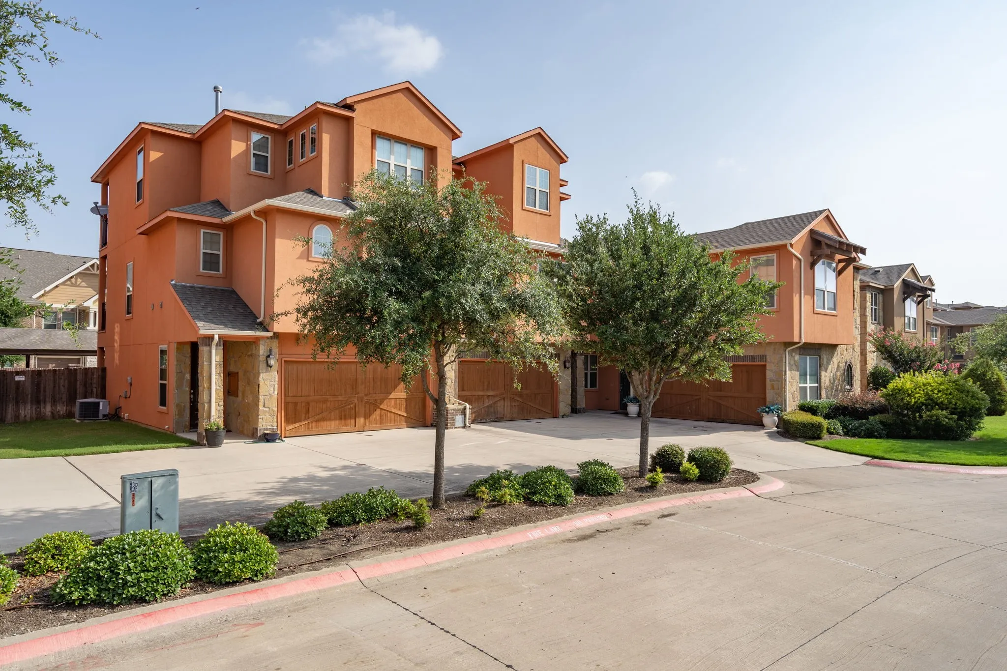 The Mediterranean inspired townhomes are built in threes, so there is no overwhelming line of buildings to get lost in.