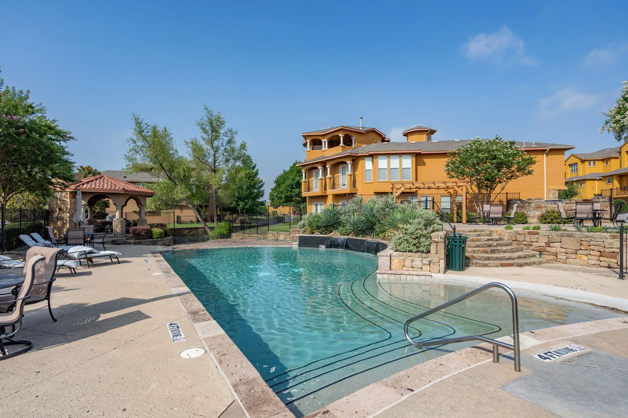 Another view of the community pool and lounge area.