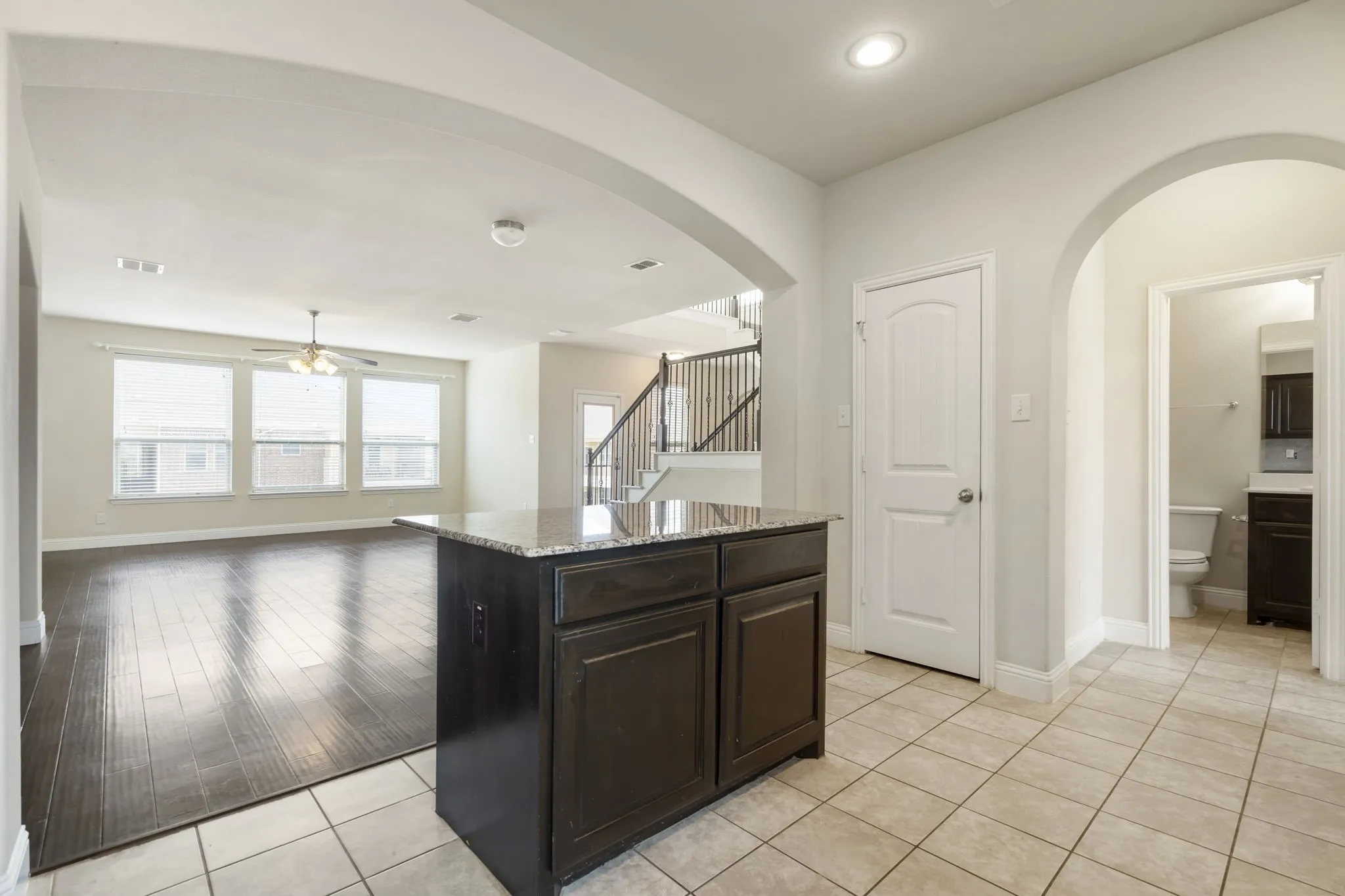 A view from the kitchen showing access to the bathroom and bedroom.