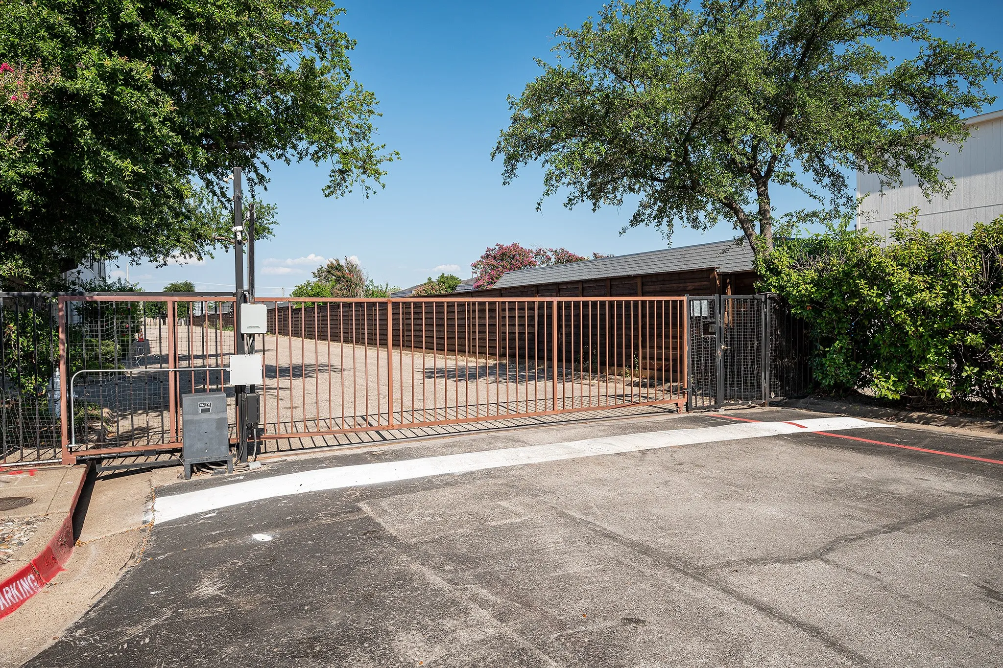 Resident only back entry/exit gate to Preston Rd.