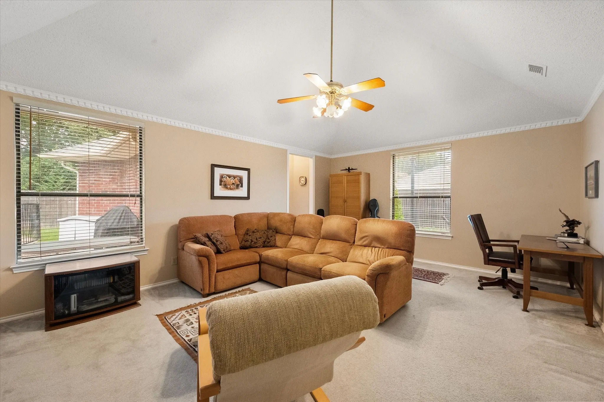 Vaulted ceiling with a ceiling fan light fixture