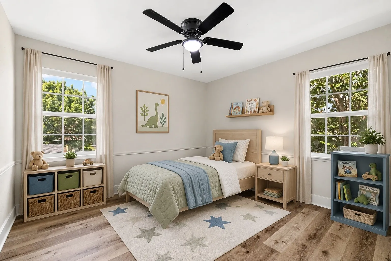 Wood-finish flooring, two large windows, white walls, and a ceiling fan with integrated lighting