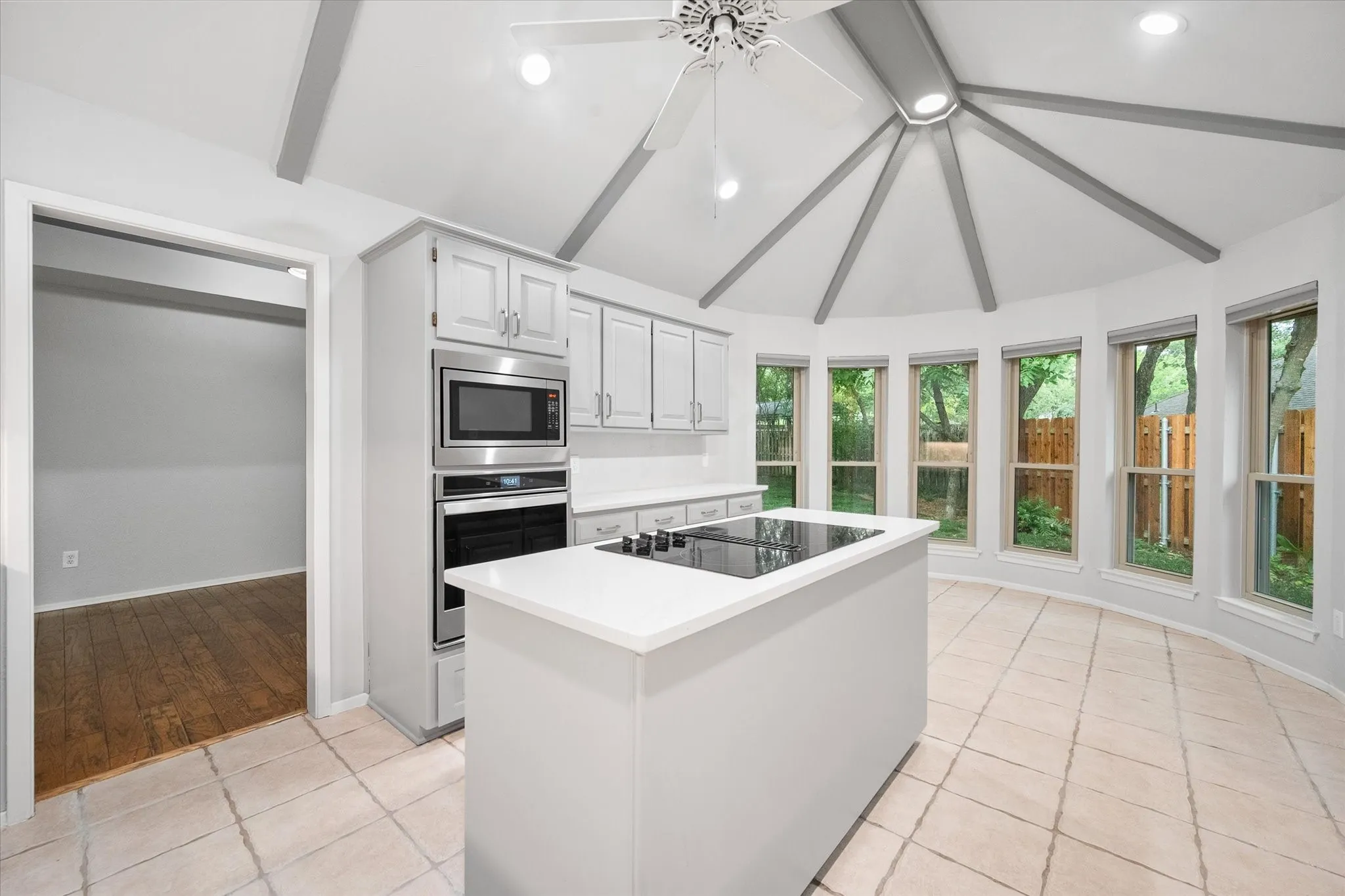 Kitchen w/ Island and Quartz counter tops