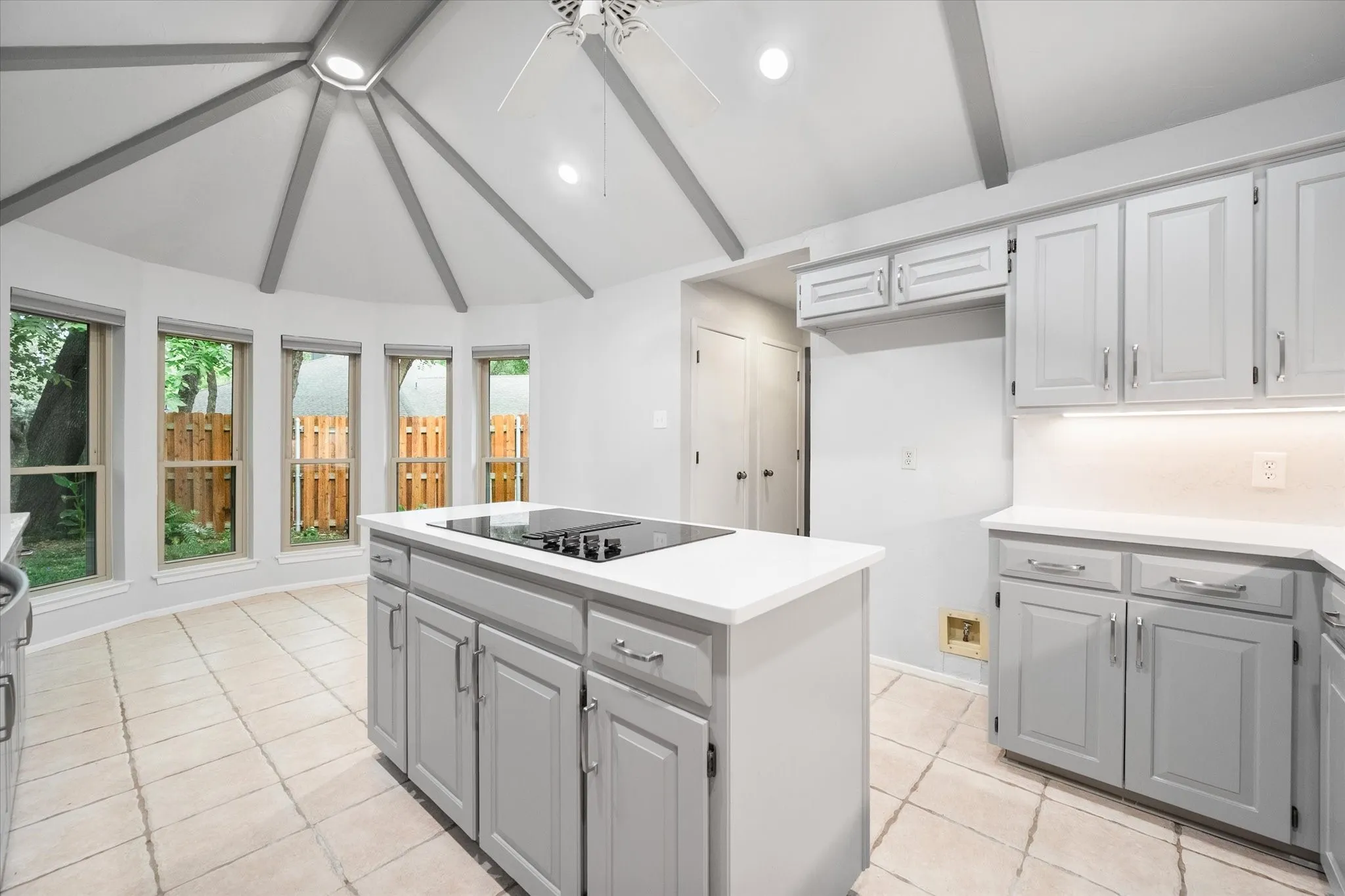 Kitchen w/ Island and Quartz counter tops