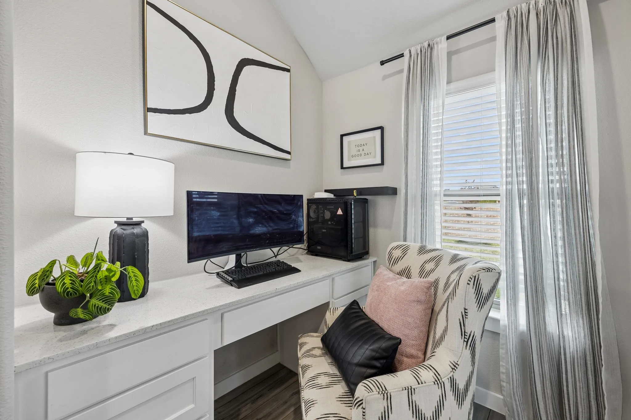 Versatile office space just off the living room. Perfect for a small home office or study room.