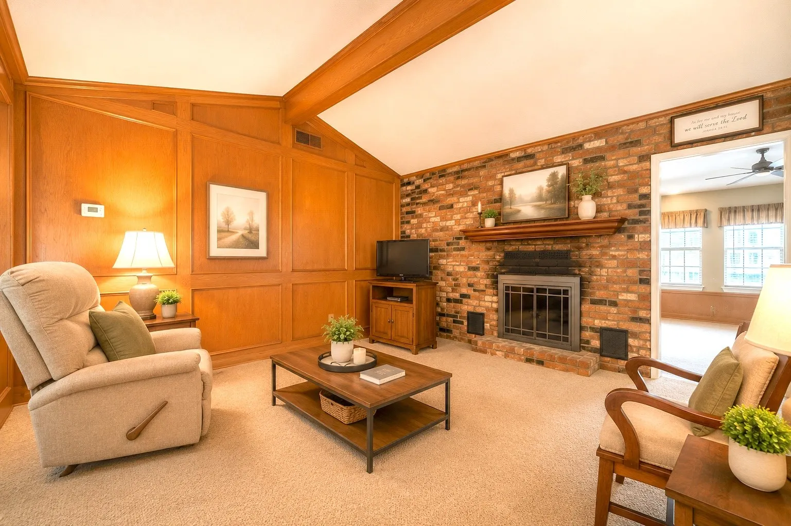 Vaulted ceiling with exposed wood beams, brick fireplace with wood mantel, wood paneling, and neutral carpet flooring-AI