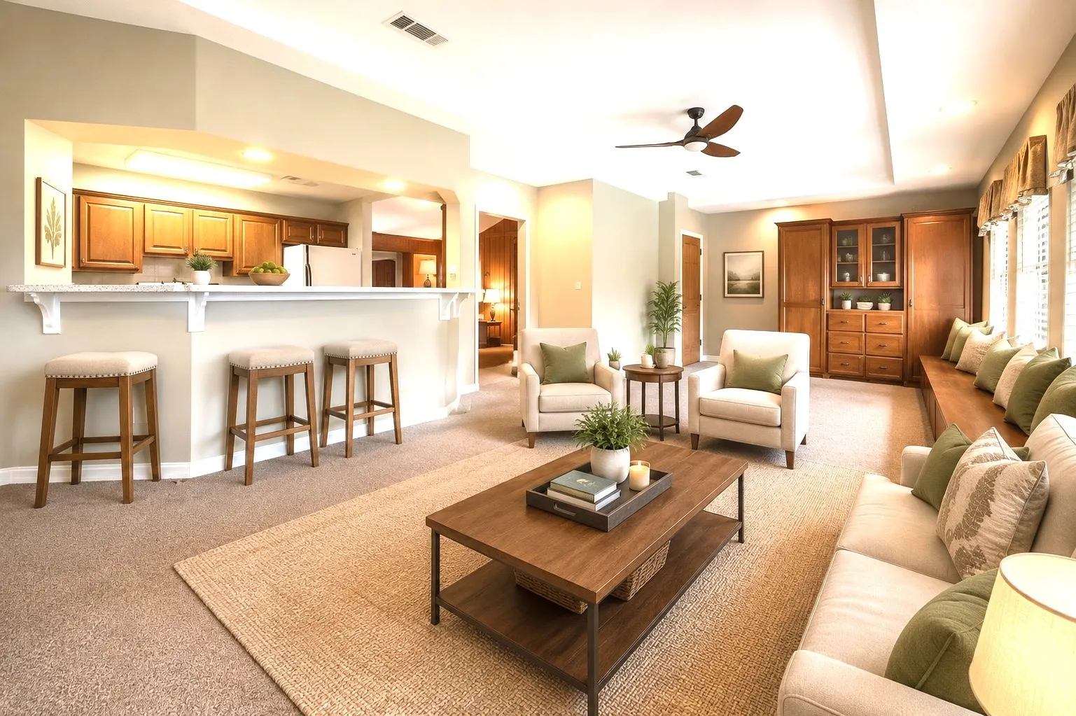 Open concept living area featuring a breakfast bar with white countertop, recessed lighting, and a tray ceiling- A
I -Layout Version 1