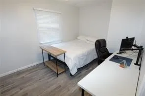 Room featuring light wood-finish flooring and neutral wall tones