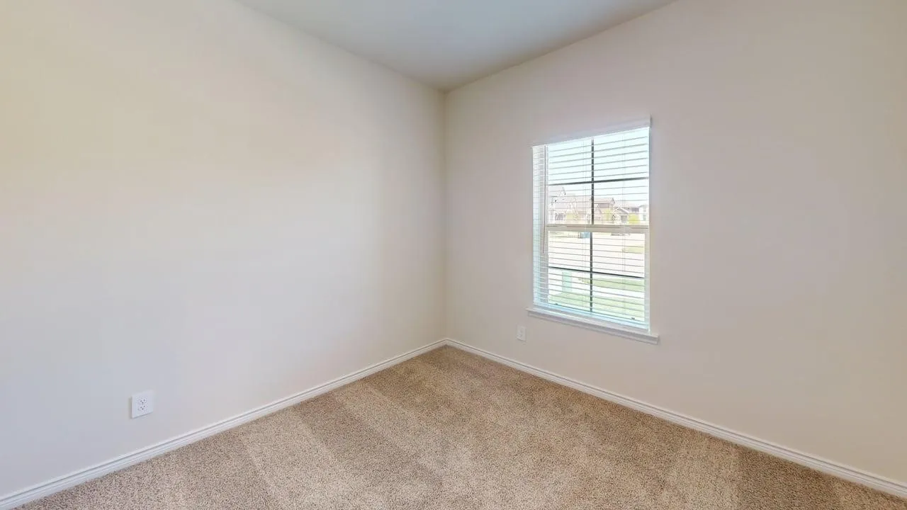 Neutral wall paint and carpeted flooring