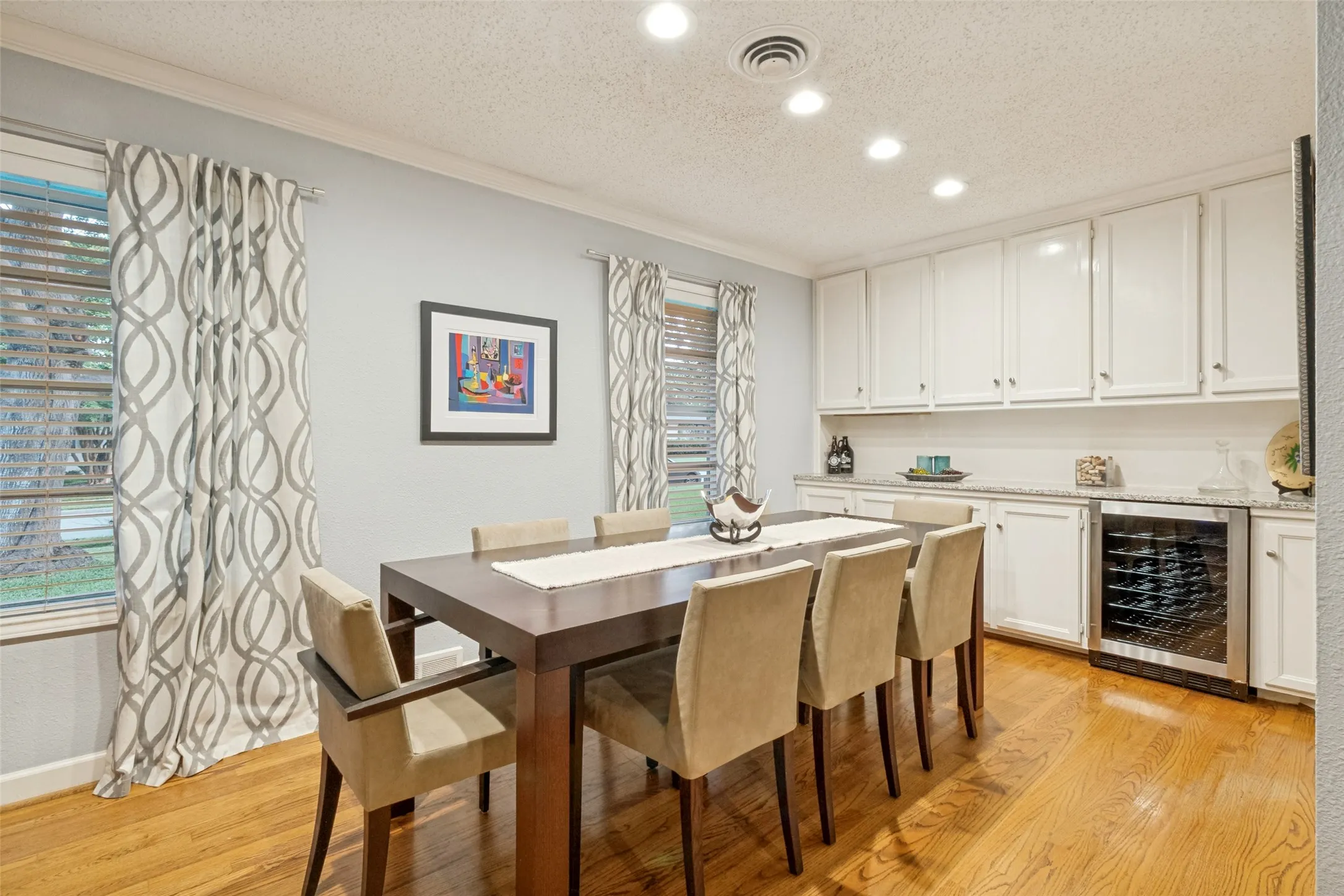 Enjoy your wine fridge and spacious dining area.