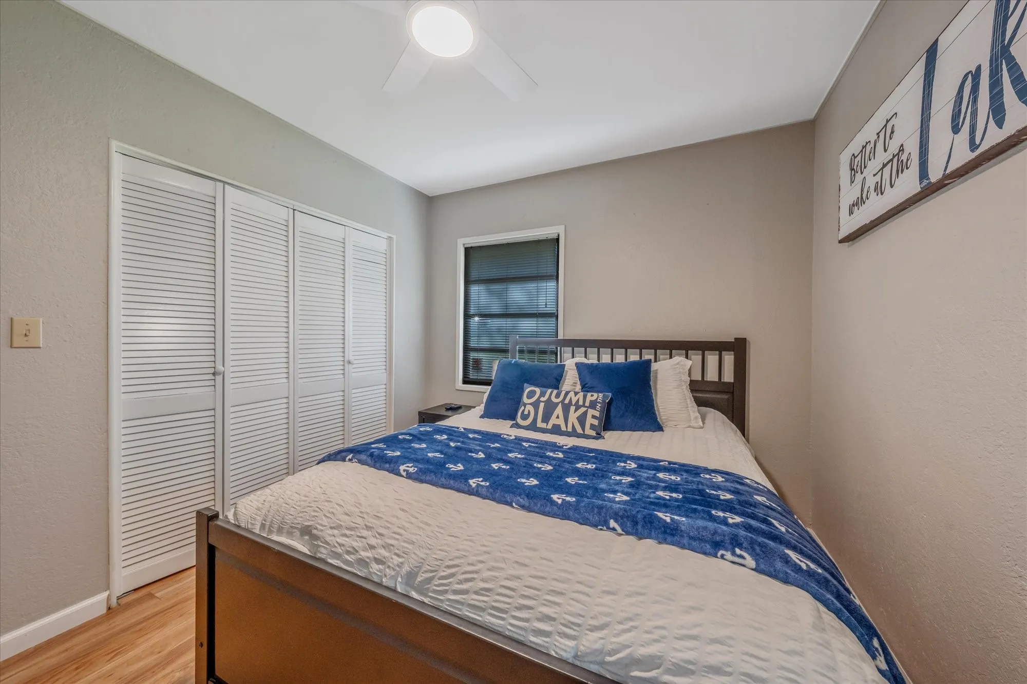 Neutral wall tones with wood-finish flooring