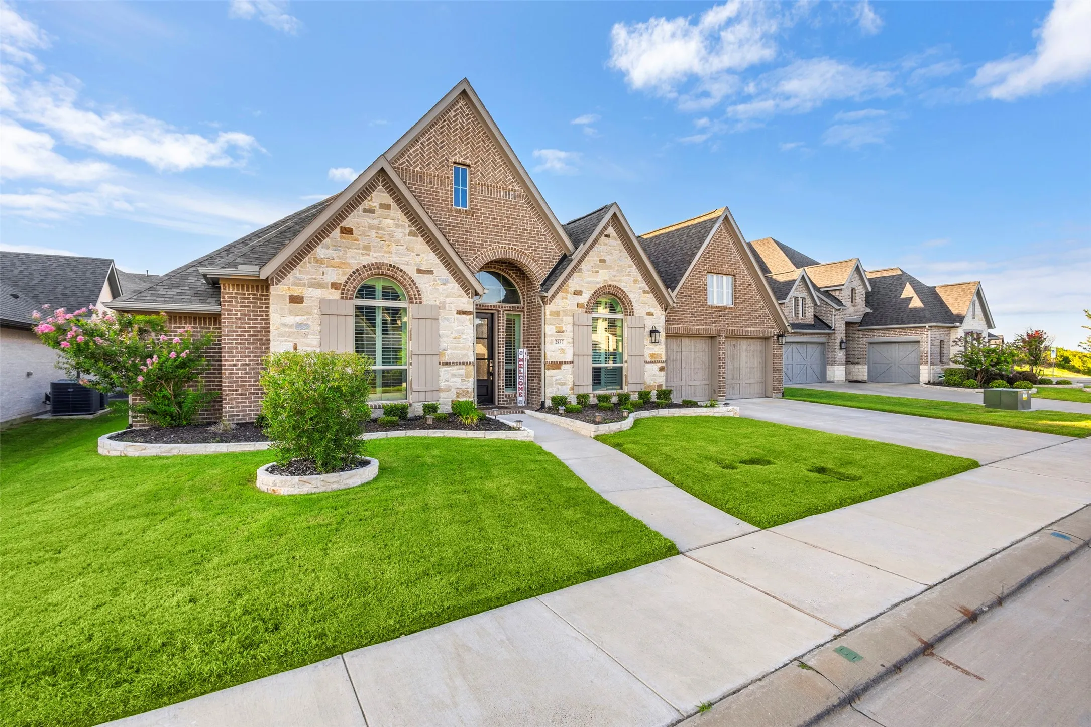 Stone and brick exterior with arched window accents