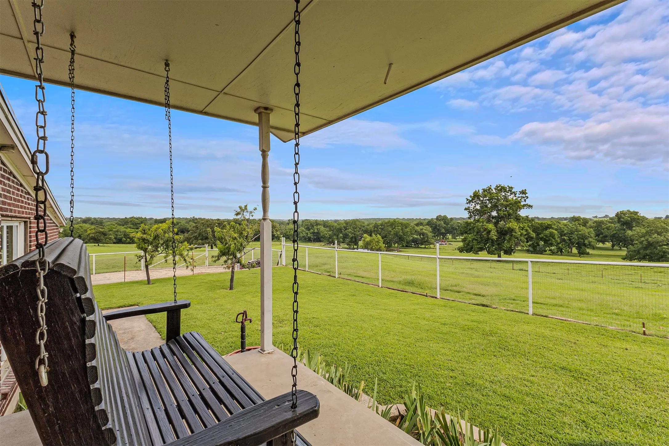 Porch swing to enjoy those beautiful Texas skies of 339 Colwell Rd in Forestburg, TX