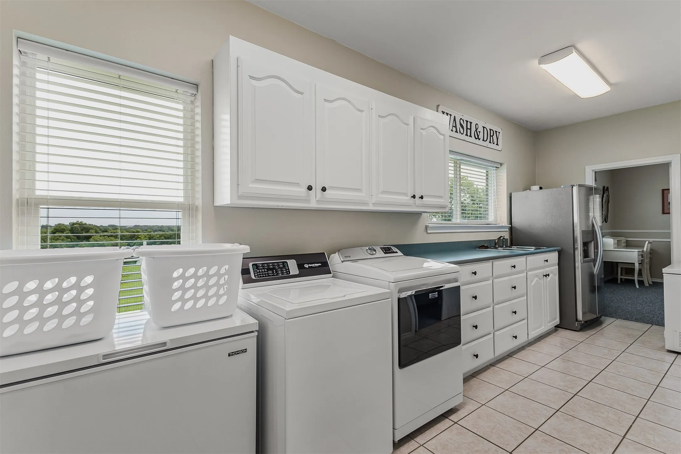 Extra large utility room with space for a second refrigerator and freezer of 339 Colwell Rd in Forestburg, TX