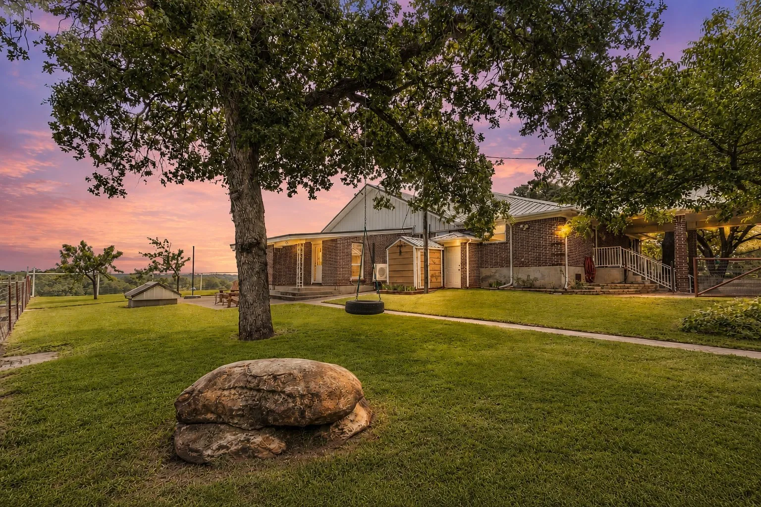 Sunset view of the beautiful backyard of 339 Colwell Rd in Forestburg, TX