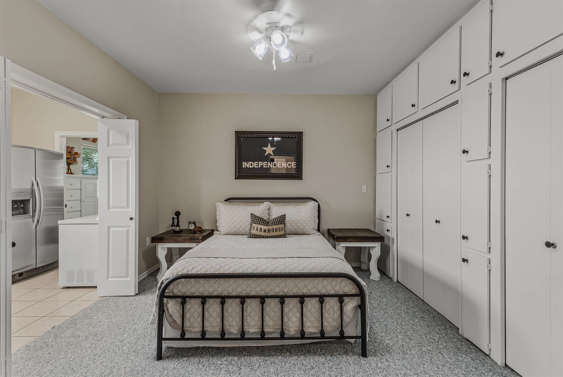 Bedroom with tons of storage and opens to utility room of 339 Colwell Rd in Forestburg, TX