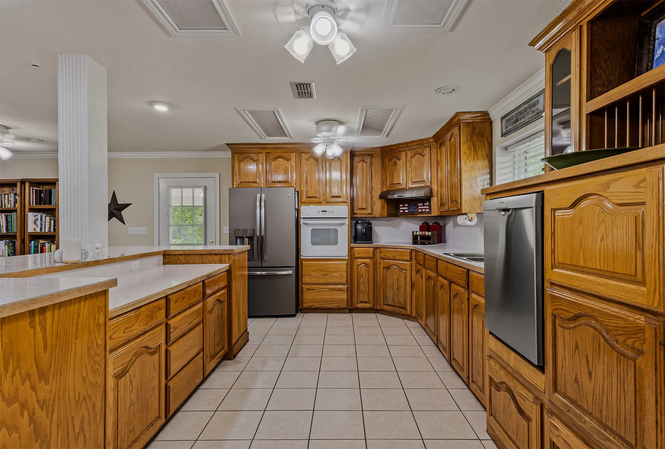 Large kitchen with island and plenty of bar seating of 339 Colwell Rd in Forestburg, TX