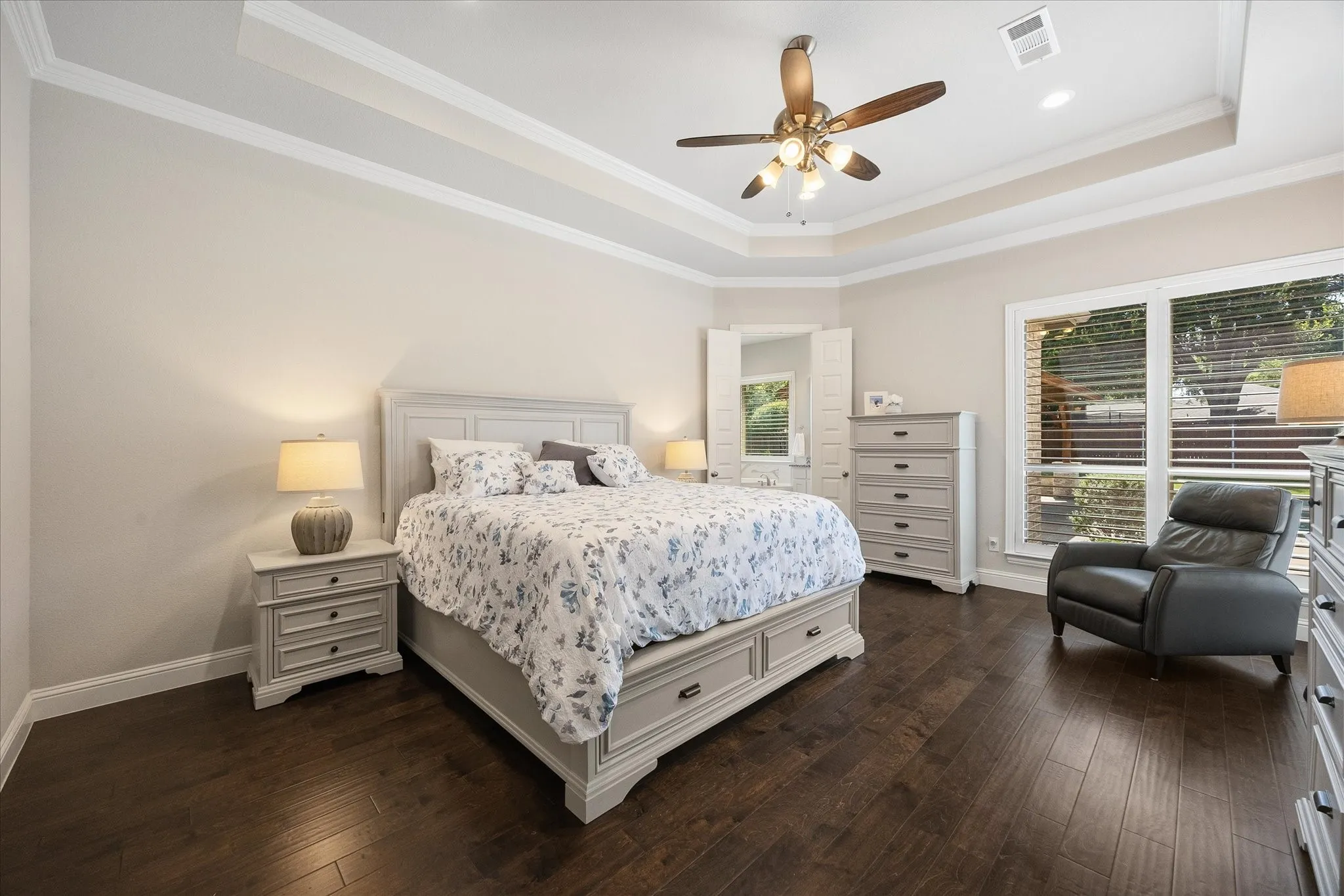 Master bedroom includes sitting area and breathtaking views of pool and outdoor area!