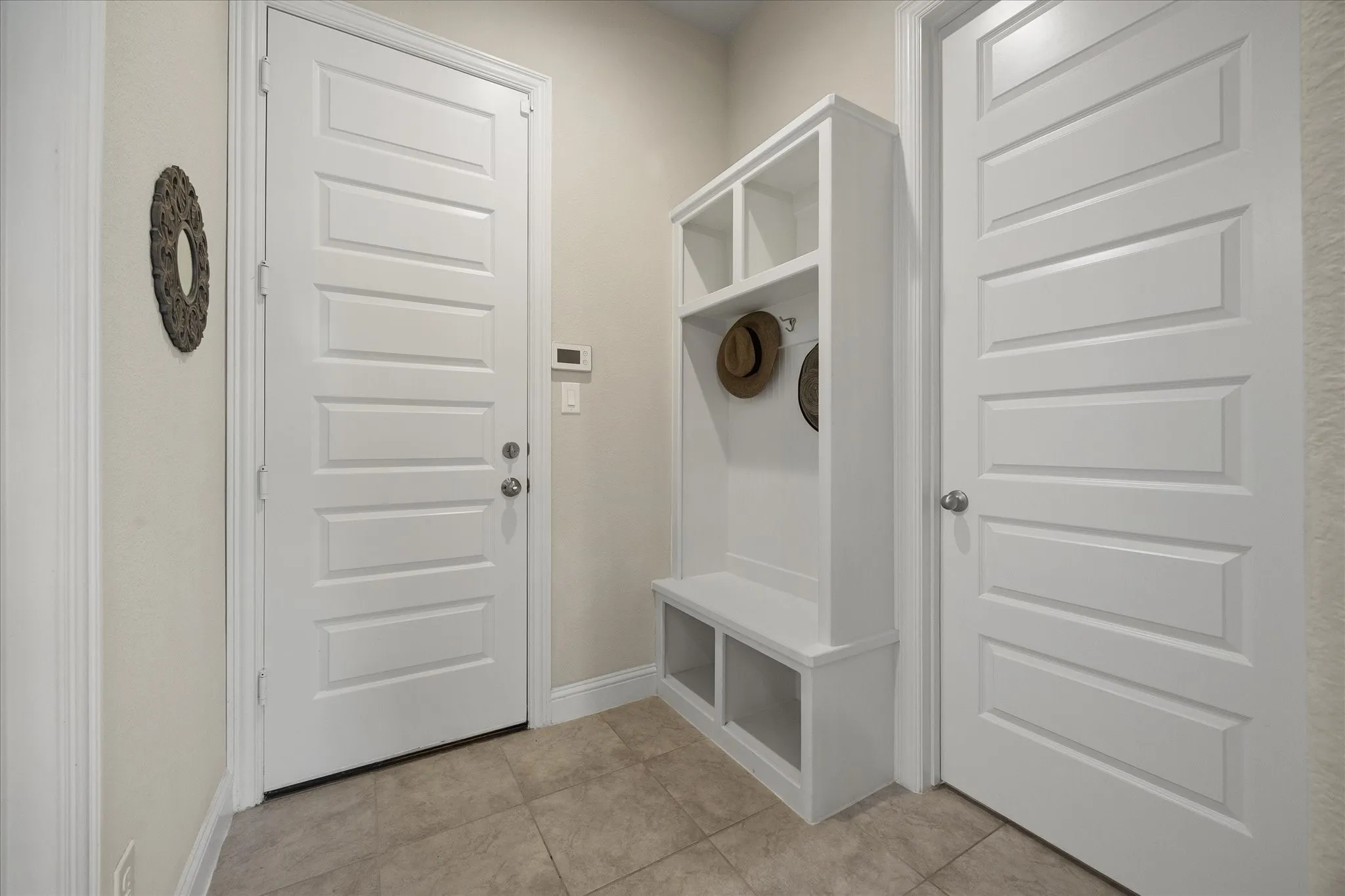 Built in drop off area is convenitenly located near garage and utility room!